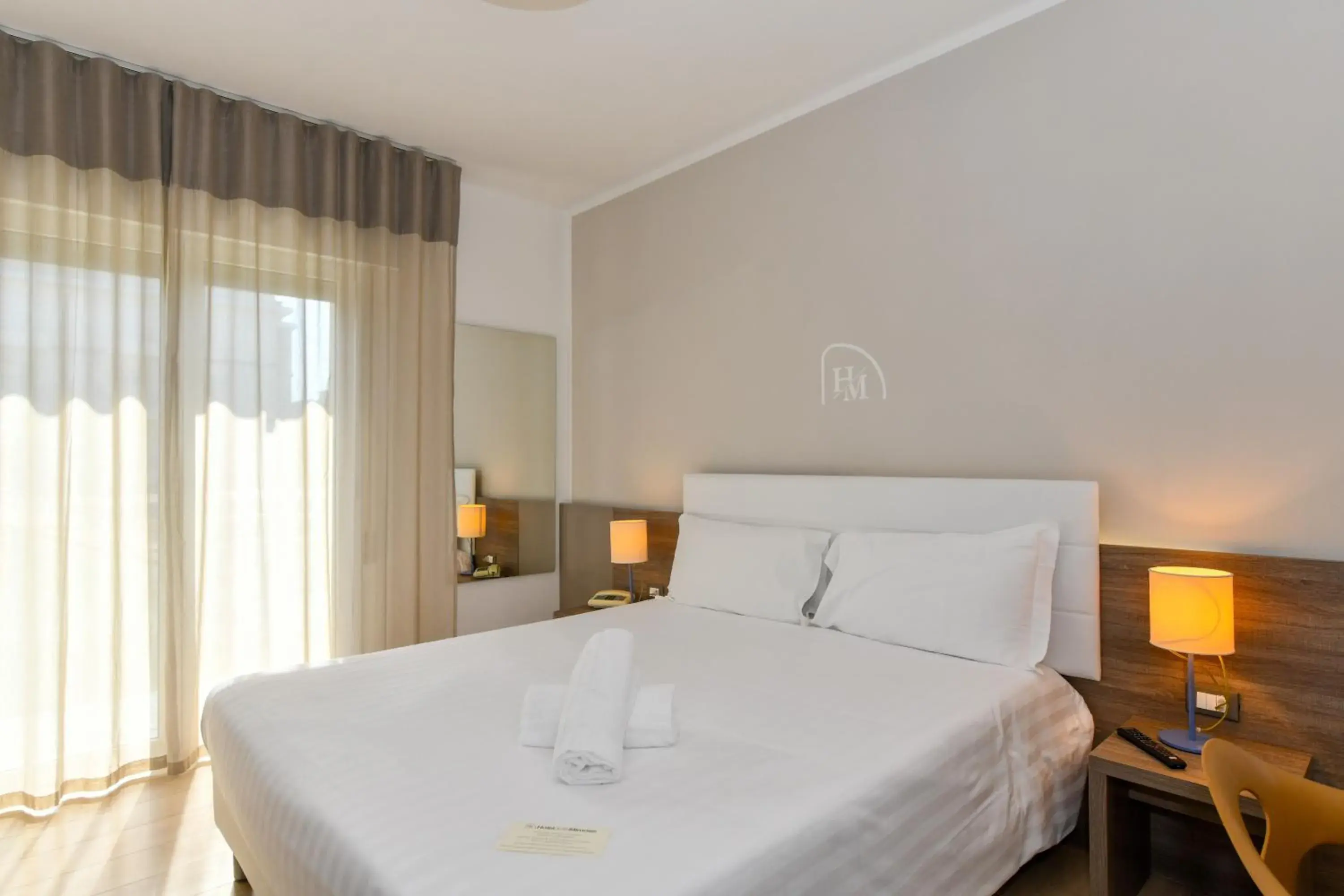 Standard Double or Twin Room with Lateral Sea View in Hotel Delle Mimose Standard Double or Twin Room with Lateral Sea View in Hotel Delle Mimose