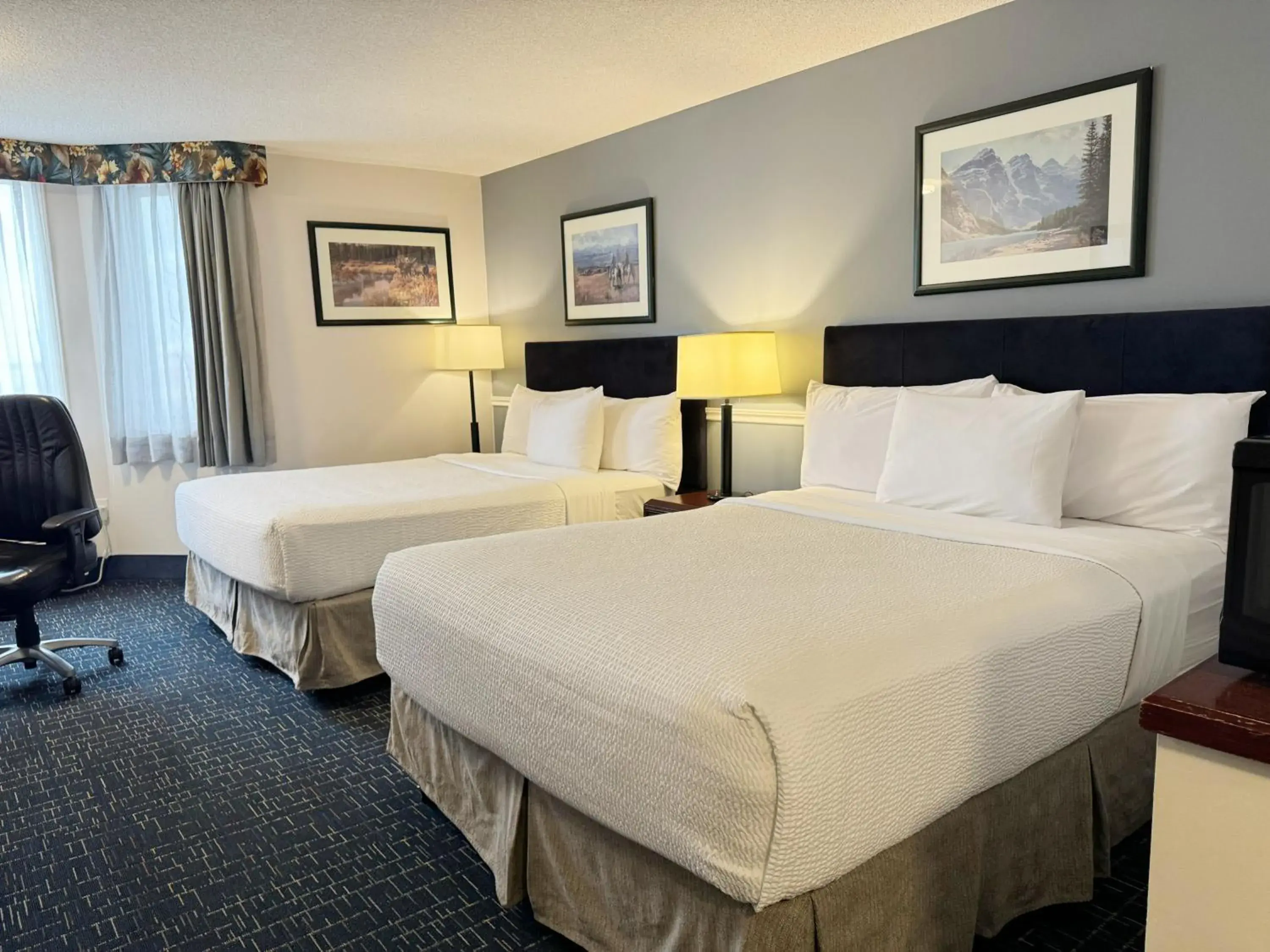 Superior Double Queen Room in Divya Sutra Plaza and Conference Centre Calgary Airport Superior Double Queen Room in Divya Sutra Plaza and Conference Centre Calgary Airport