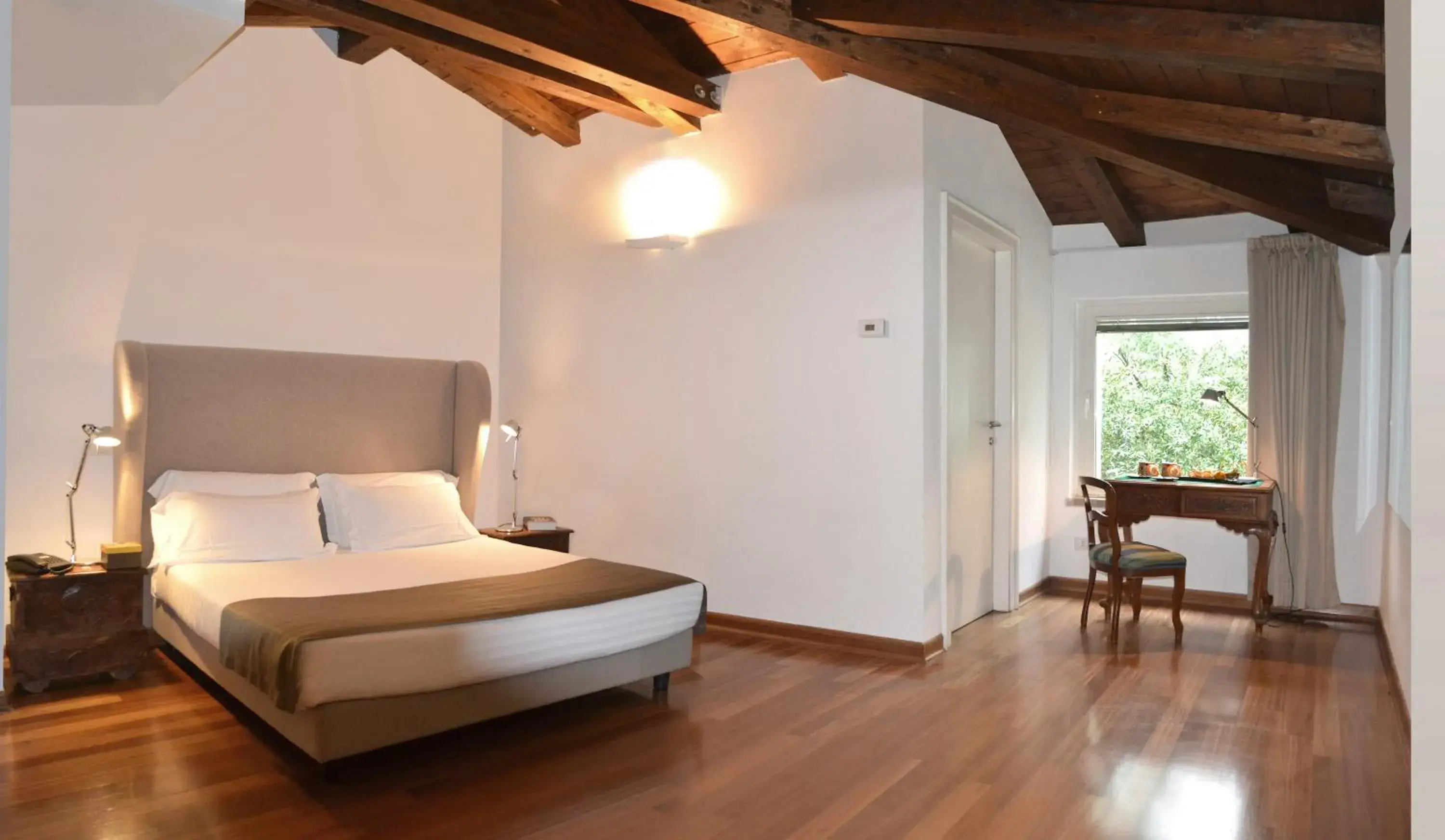 Deluxe Triple Room in Finis Africae Hotel Deluxe Triple Room in Finis Africae Hotel