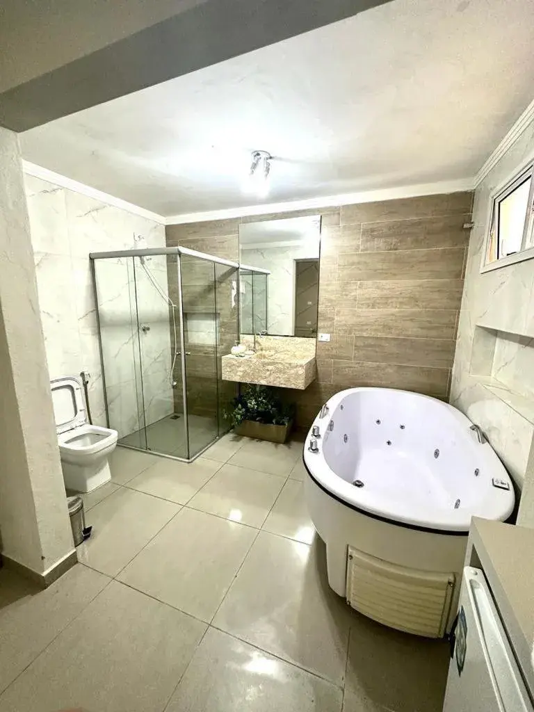 Deluxe Suite with Spa Bath in Pousada Praia Grande Deluxe Suite with Spa Bath in Pousada Praia Grande