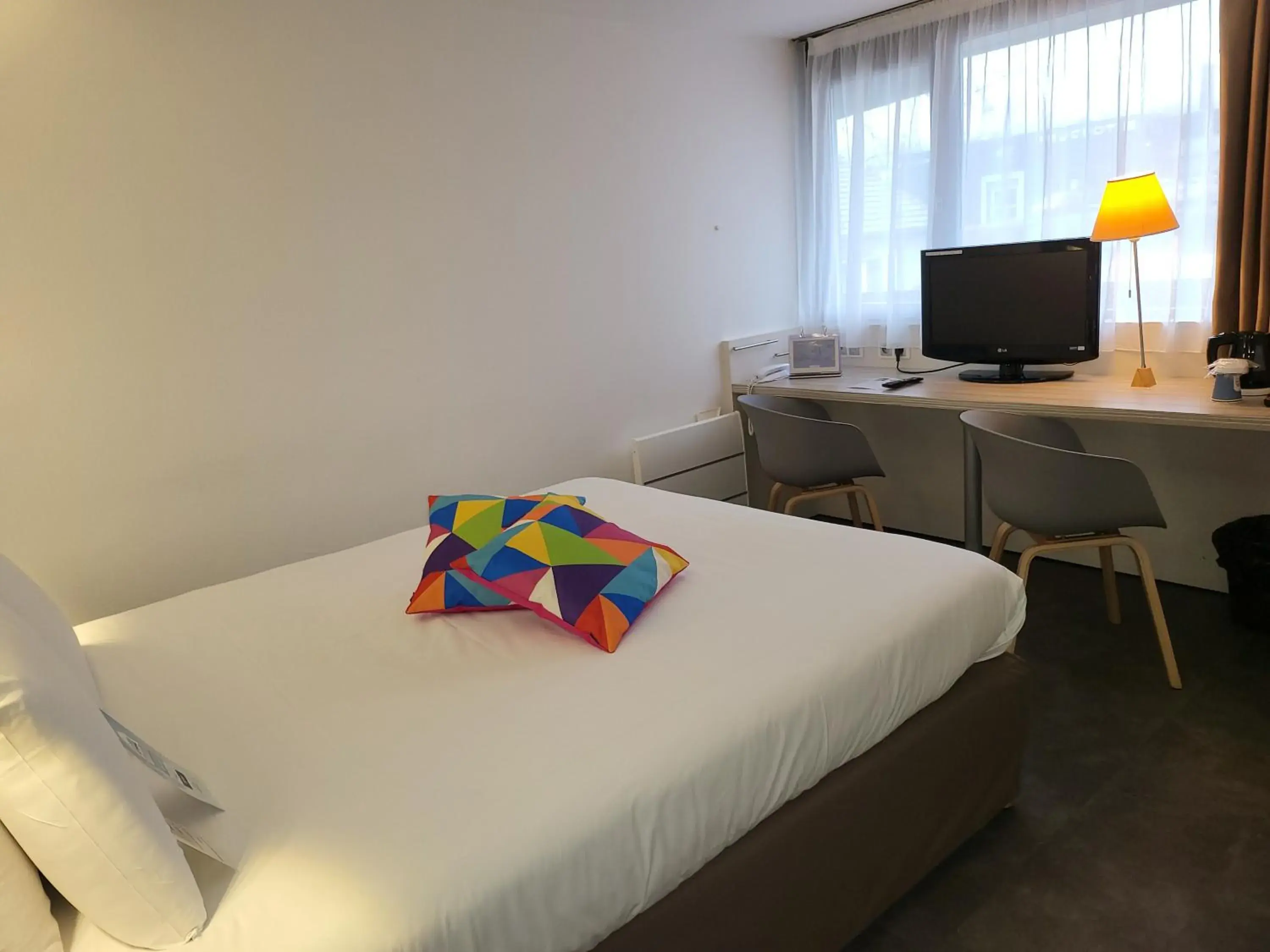 Twin Room in Kyriad Bellegarde - Genève Twin Room in Kyriad Bellegarde - Genève