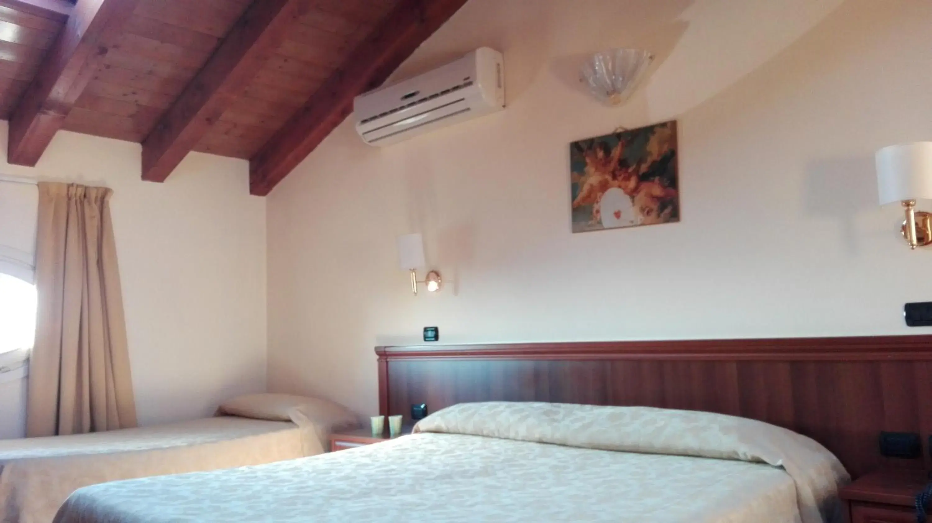 Quadruple Room in Corte Degli Estensi Quadruple Room in Corte Degli Estensi