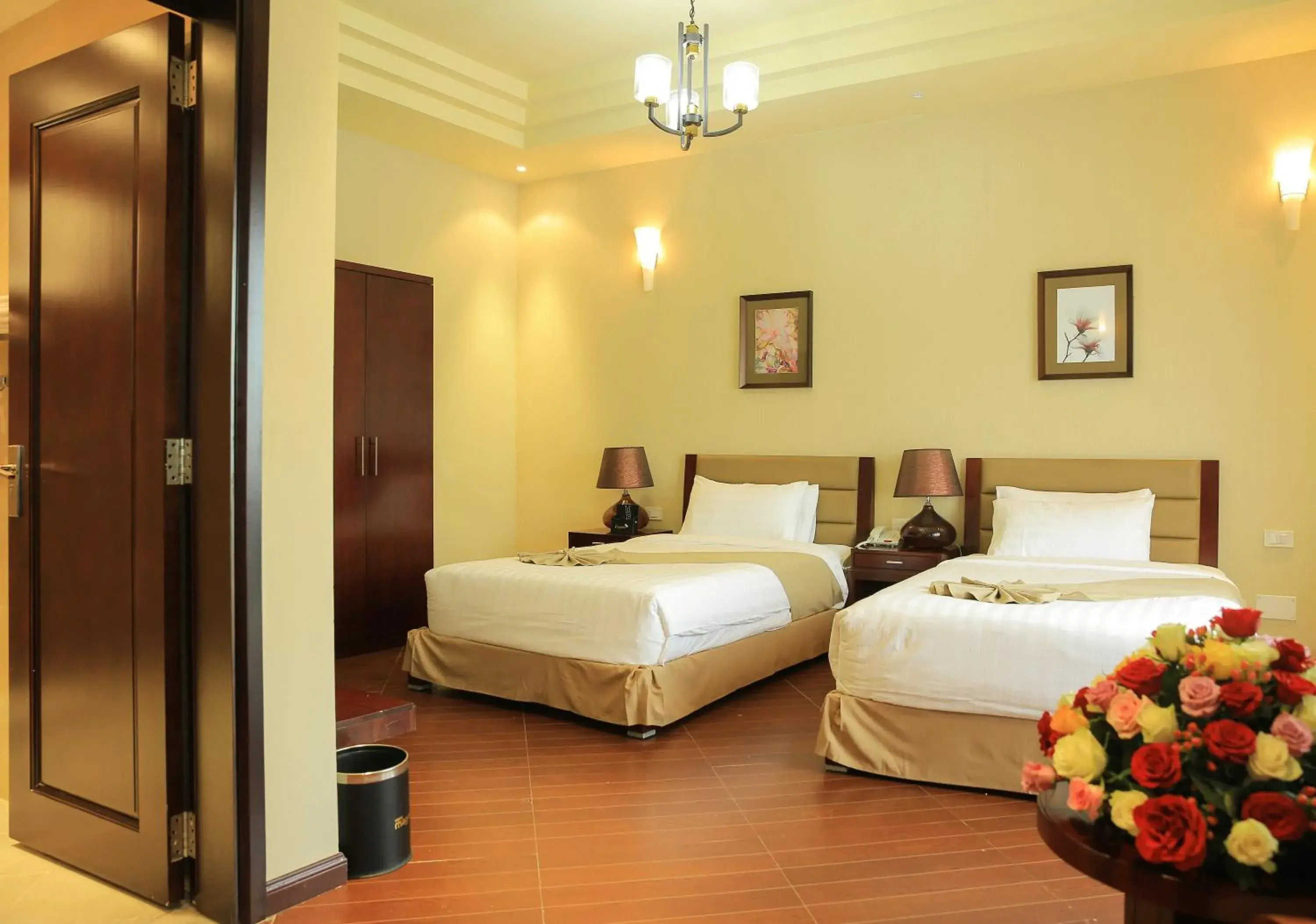 Deluxe Twin Room in Magnolia Hotel & Conference Center Deluxe Twin Room in Magnolia Hotel & Conference Center