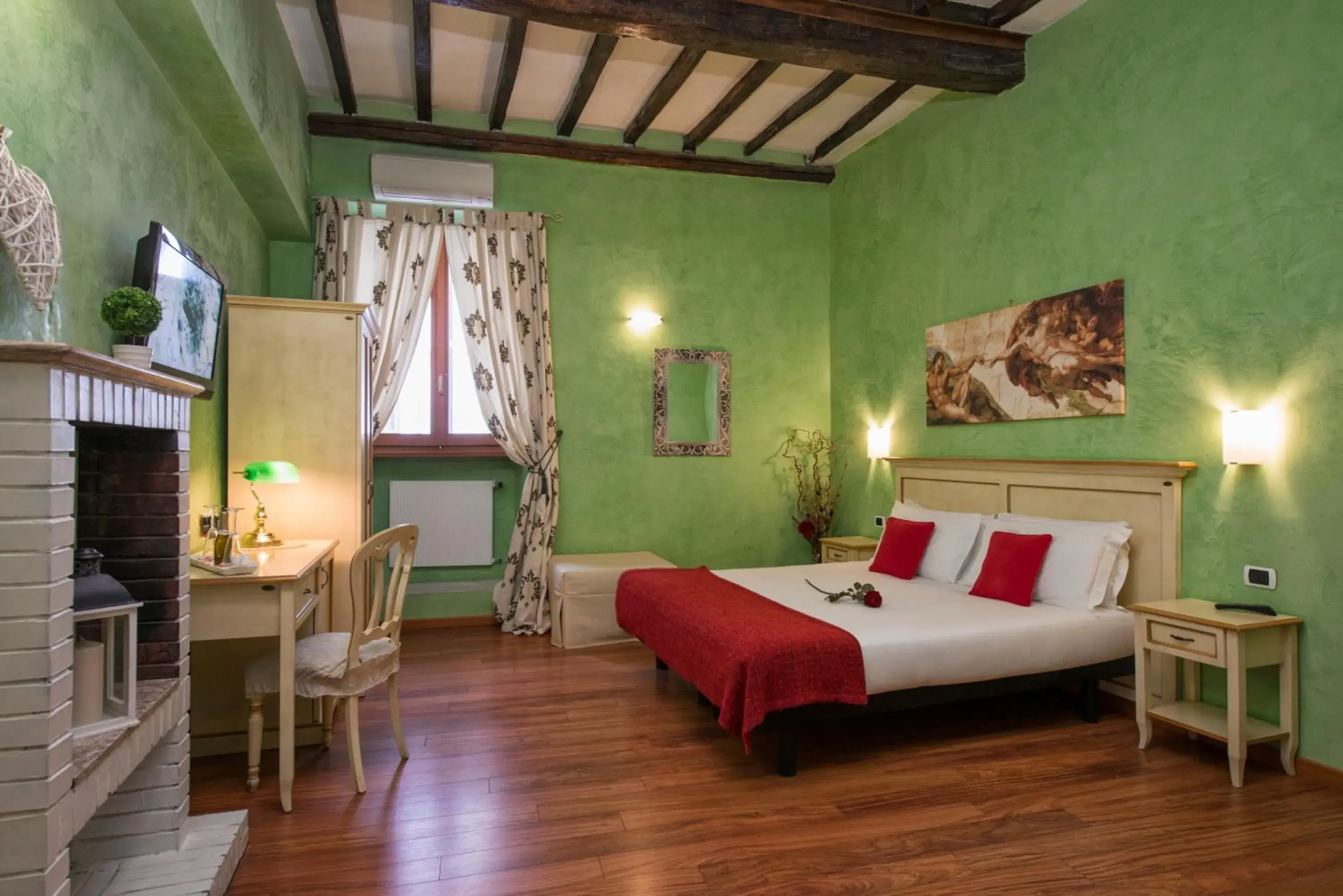 Superior Quadruple Room with 1 double bed and 1 sofa bed in Navona Tower Relais Superior Quadruple Room with 1 double bed and 1 sofa bed in Navona Tower Relais