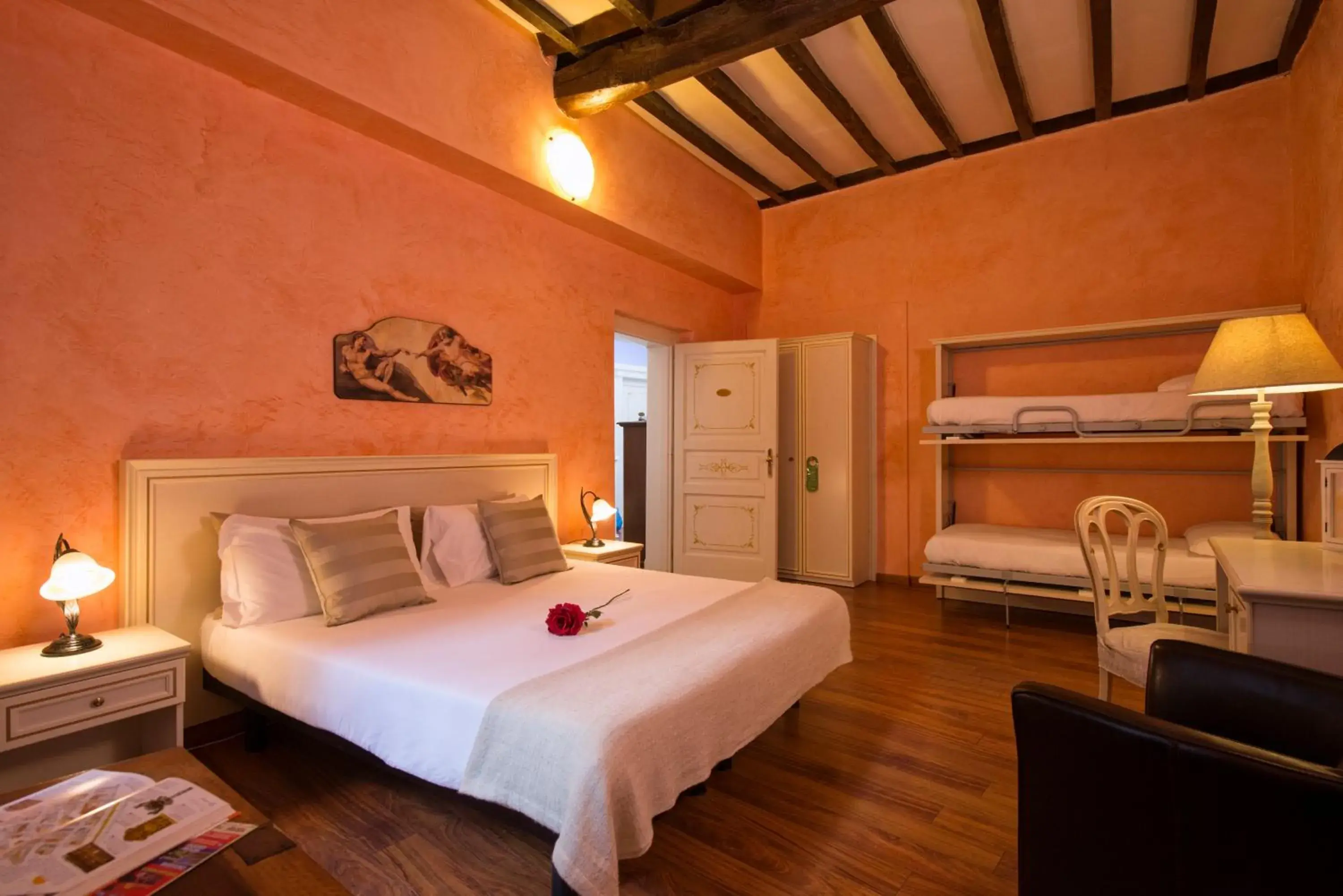 Superior Quadruple Room with 1 double bed and 1 bunk bed in Navona Tower Relais Superior Quadruple Room with 1 double bed and 1 bunk bed in Navona Tower Relais