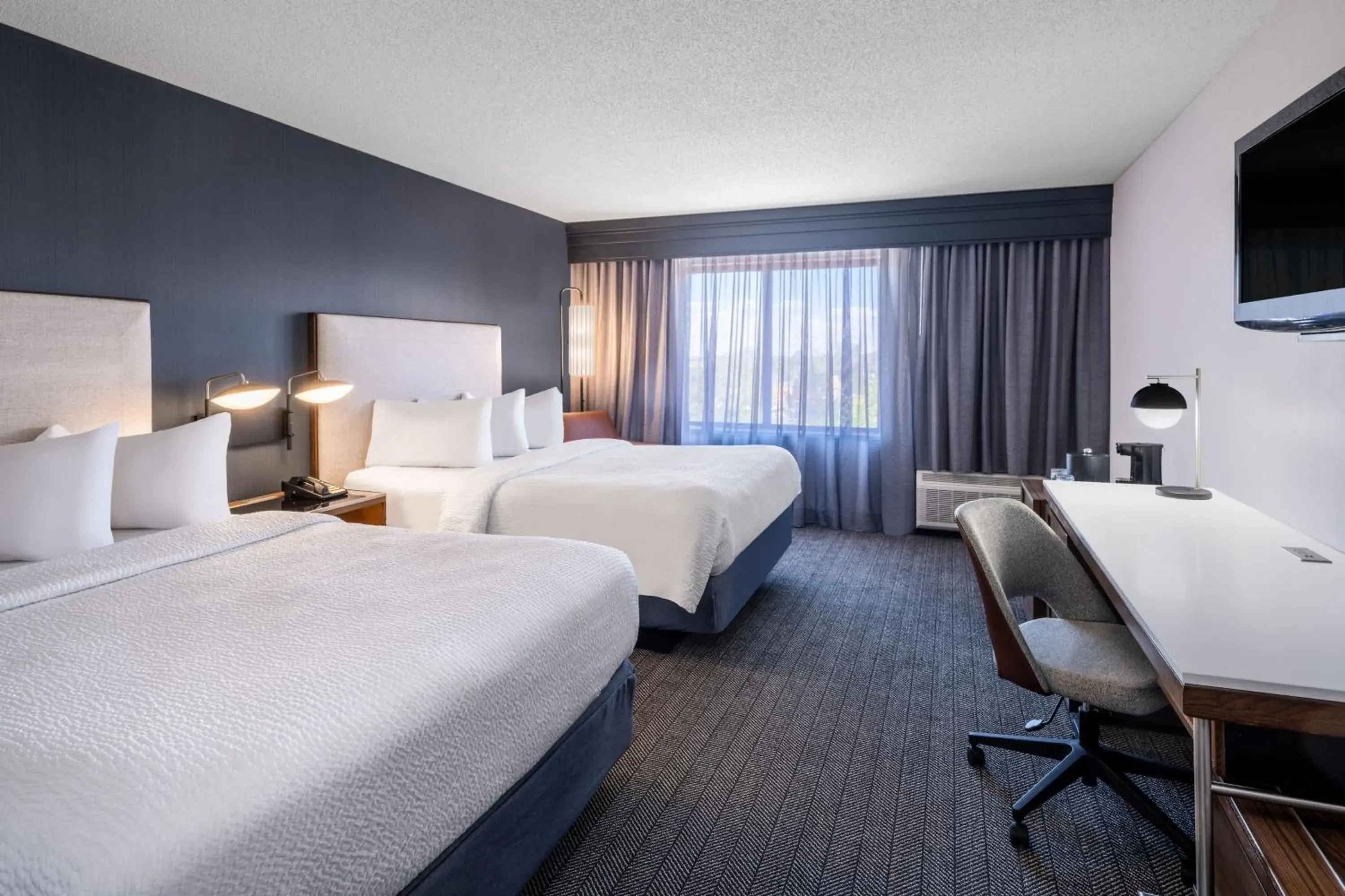 Queen Room with Two Queen Beds and Courtyard View in Courtyard by Marriott Colorado Springs South Queen Room with Two Queen Beds and Courtyard View in Courtyard by Marriott Colorado Springs South