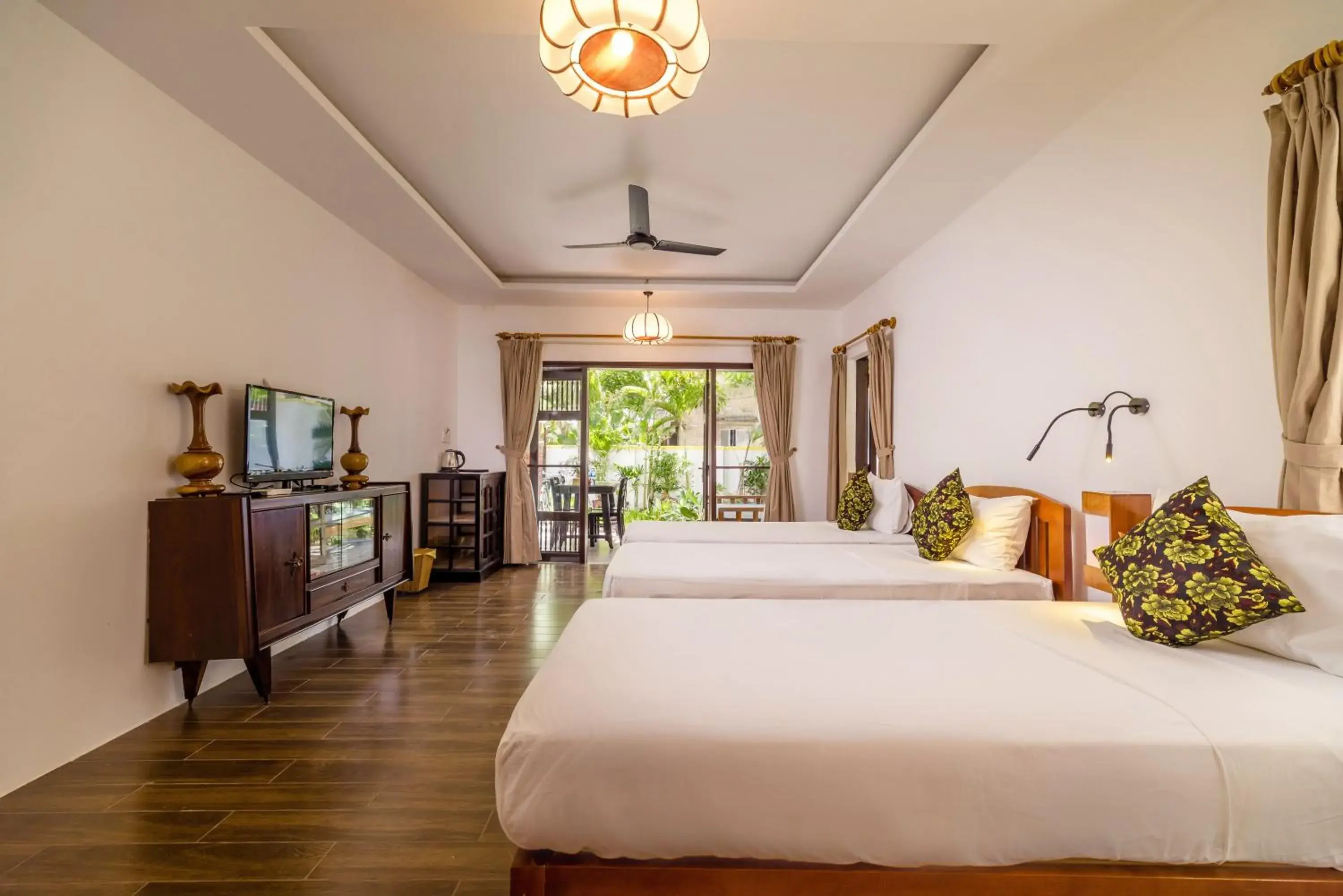 Deluxe Triple Room in An Bang Coco Villa Deluxe Triple Room in An Bang Coco Villa