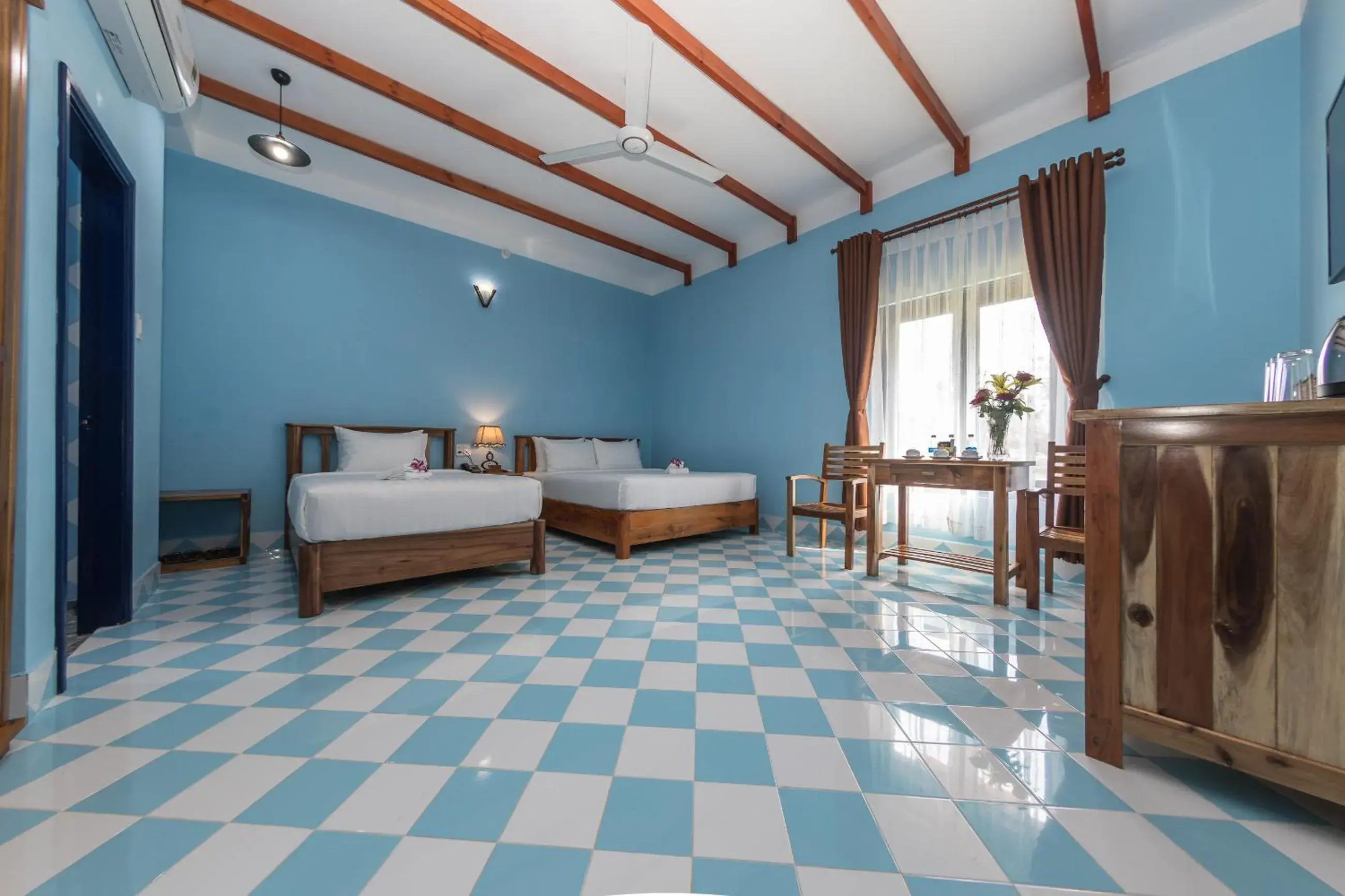 Deluxe Triple Room in Isabella Resort Deluxe Triple Room in Isabella Resort