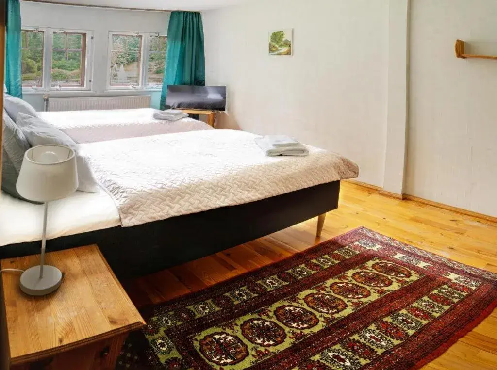 Standard Triple Room in Park Hotel Brūzis Standard Triple Room in Park Hotel Brūzis