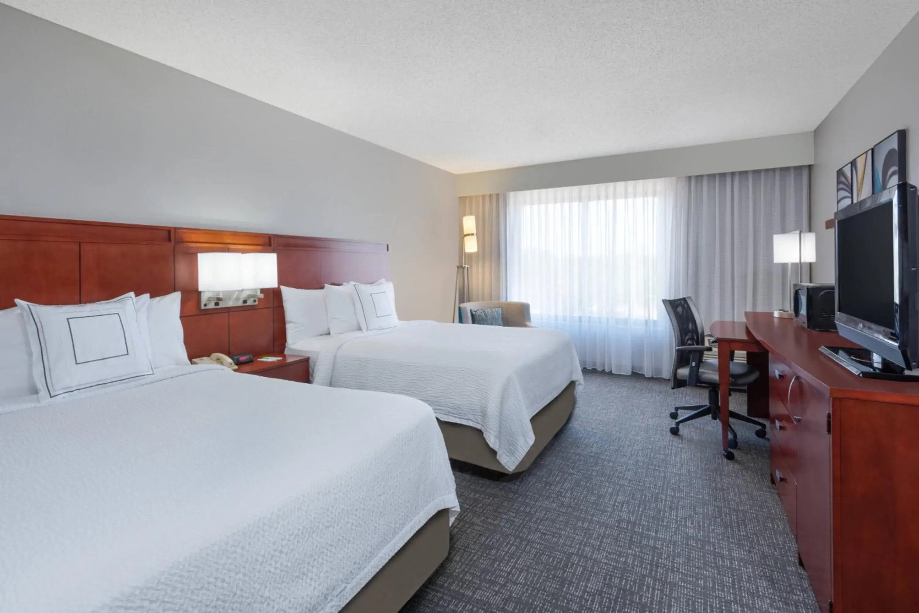 Larger Guest Room with Two Double Beds and Sofa Bed in Courtyard Harlingen Larger Guest Room with Two Double Beds and Sofa Bed in Courtyard Harlingen