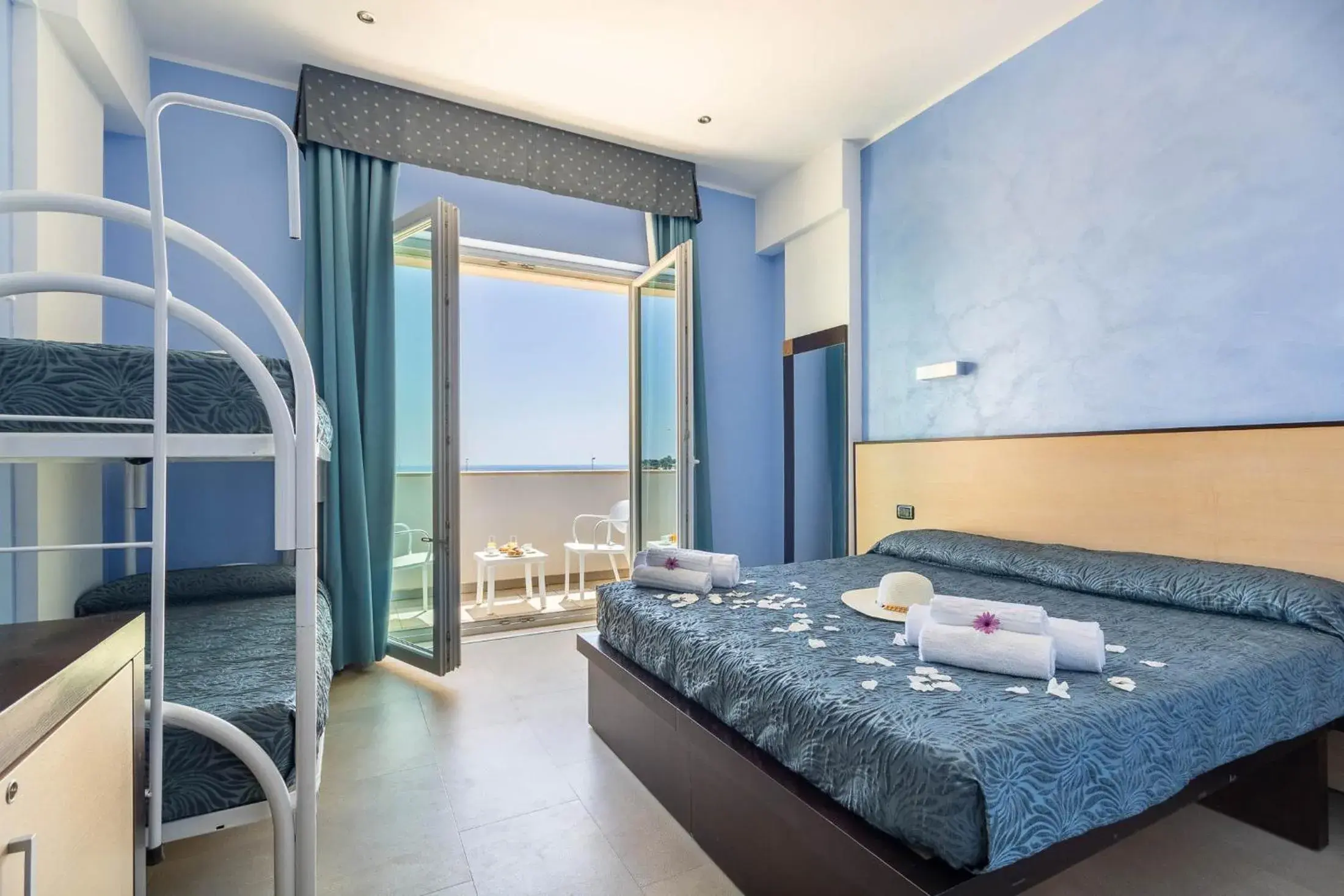 Quadruple Room with Balcony and See View in Jonico Hotel Quadruple Room with Balcony and See View in Jonico Hotel