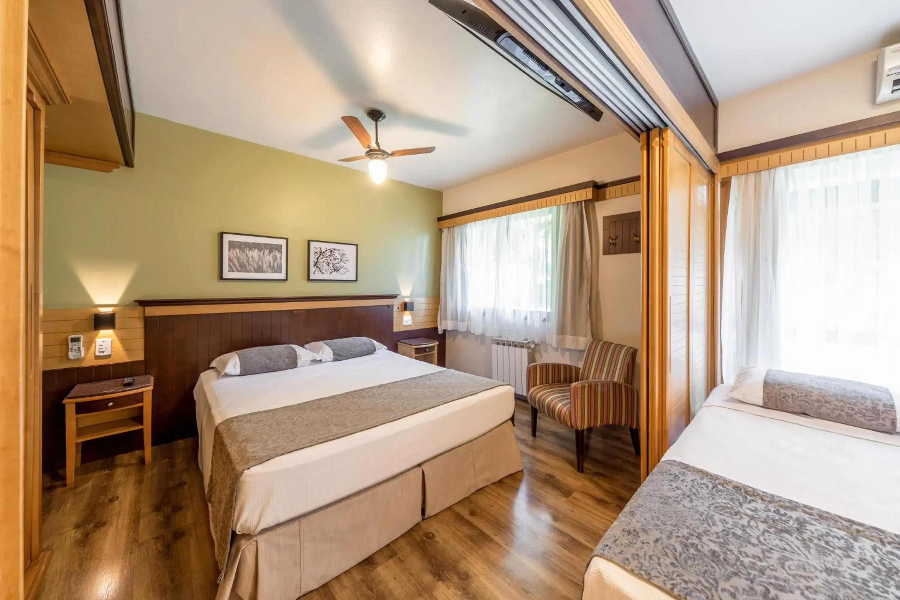 Luxury Quadruple Room in Hotel Laghetto Toscana Luxury Quadruple Room in Hotel Laghetto Toscana