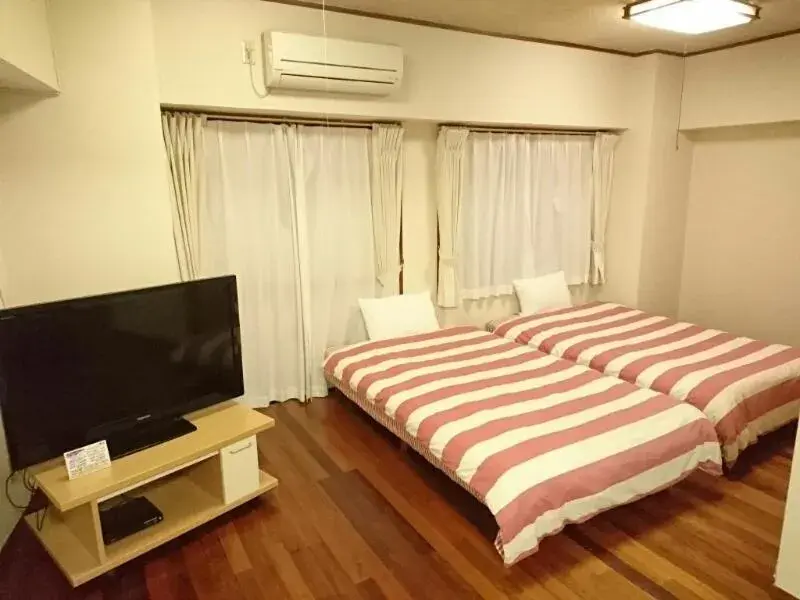 Deluxe Twin Room - single occupancy in Kokusai Towns Inn Deluxe Twin Room - single occupancy in Kokusai Towns Inn