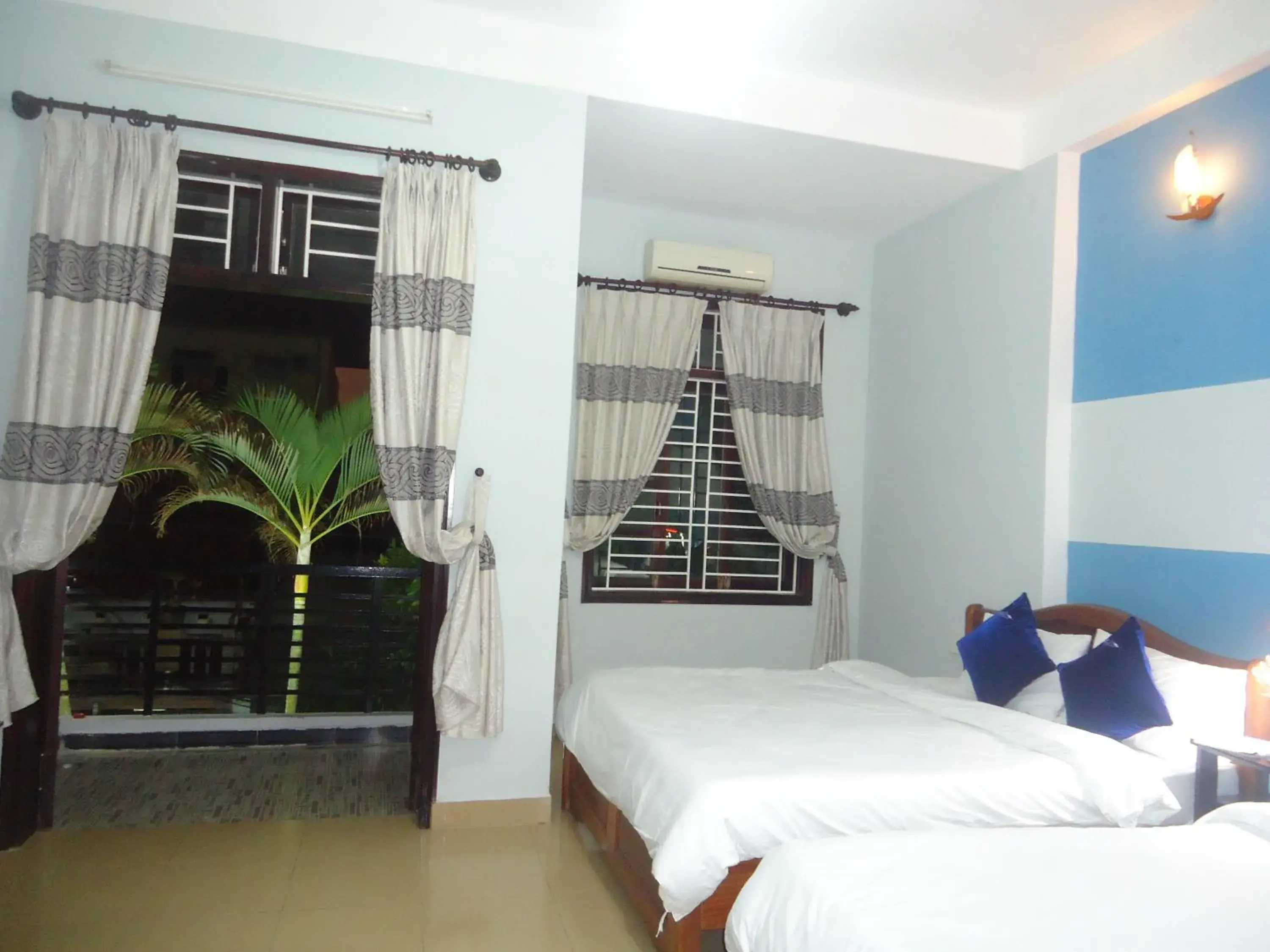 Superior Queen Room with Two Queen Beds in Hana Homestay Danang Superior Queen Room with Two Queen Beds in Hana Homestay Danang