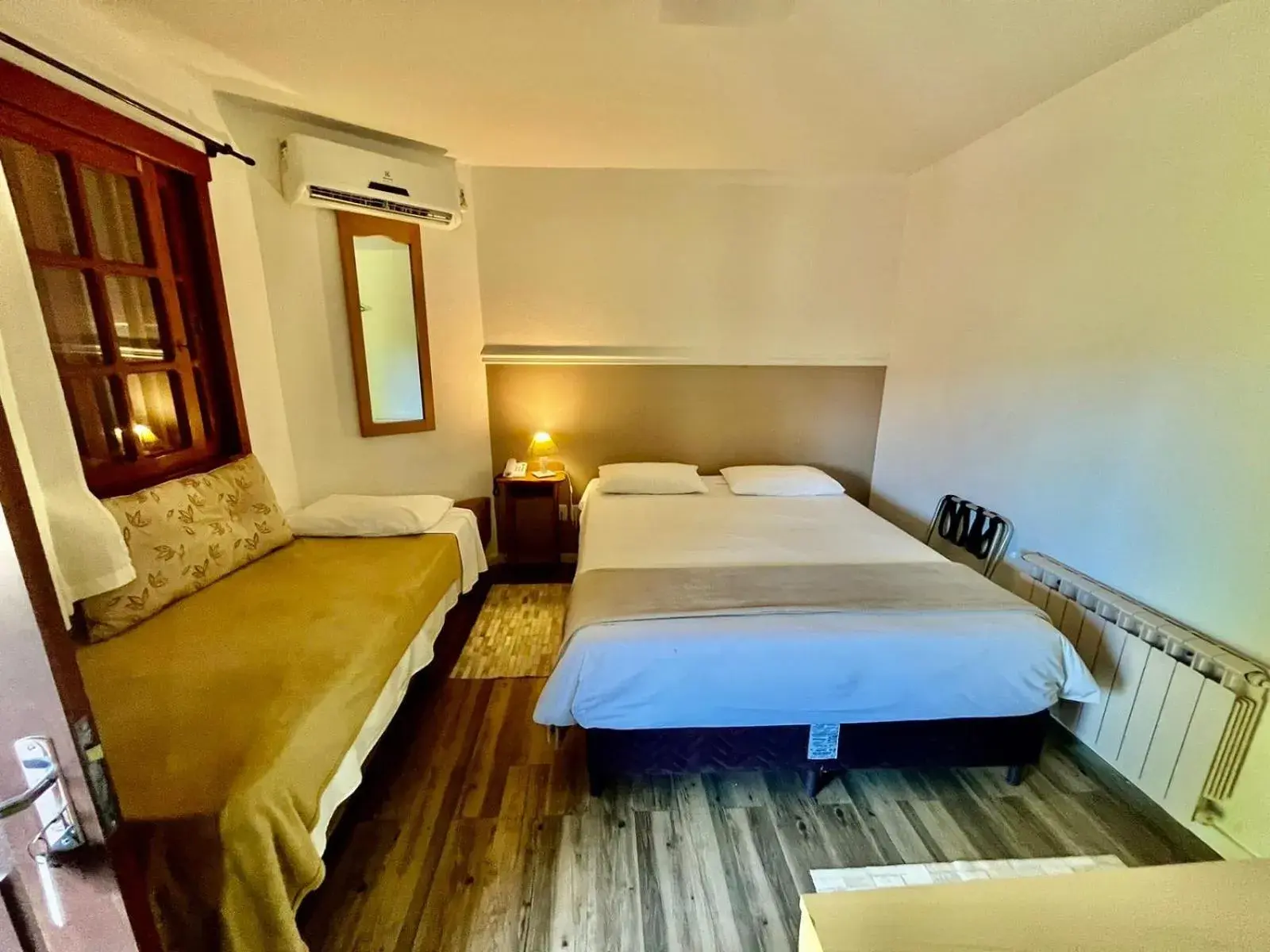 Basic Triple Room in Pousada Rosa Basic Triple Room in Pousada Rosa