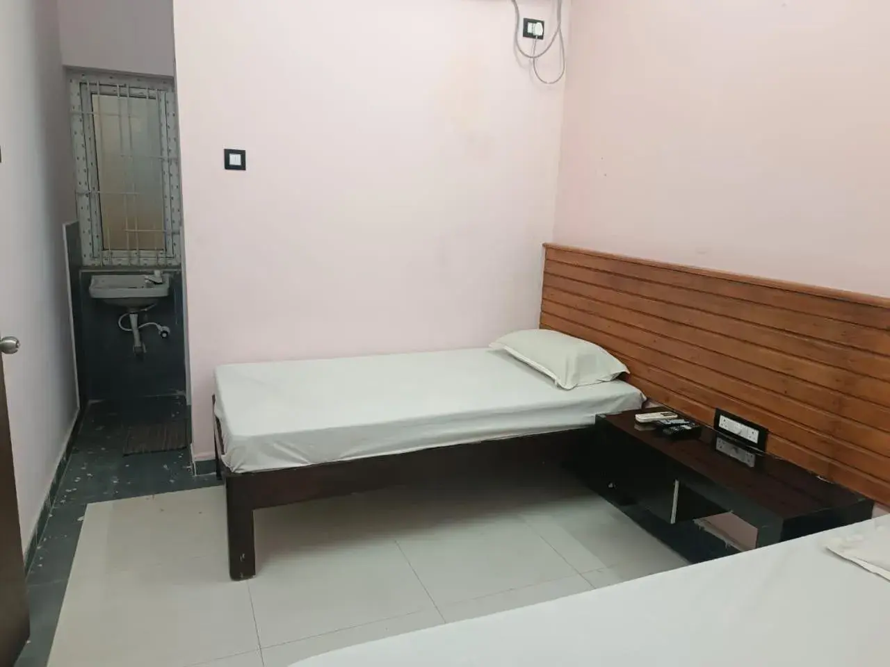 Basic Triple Room in SGS Residency Basic Triple Room in SGS Residency
