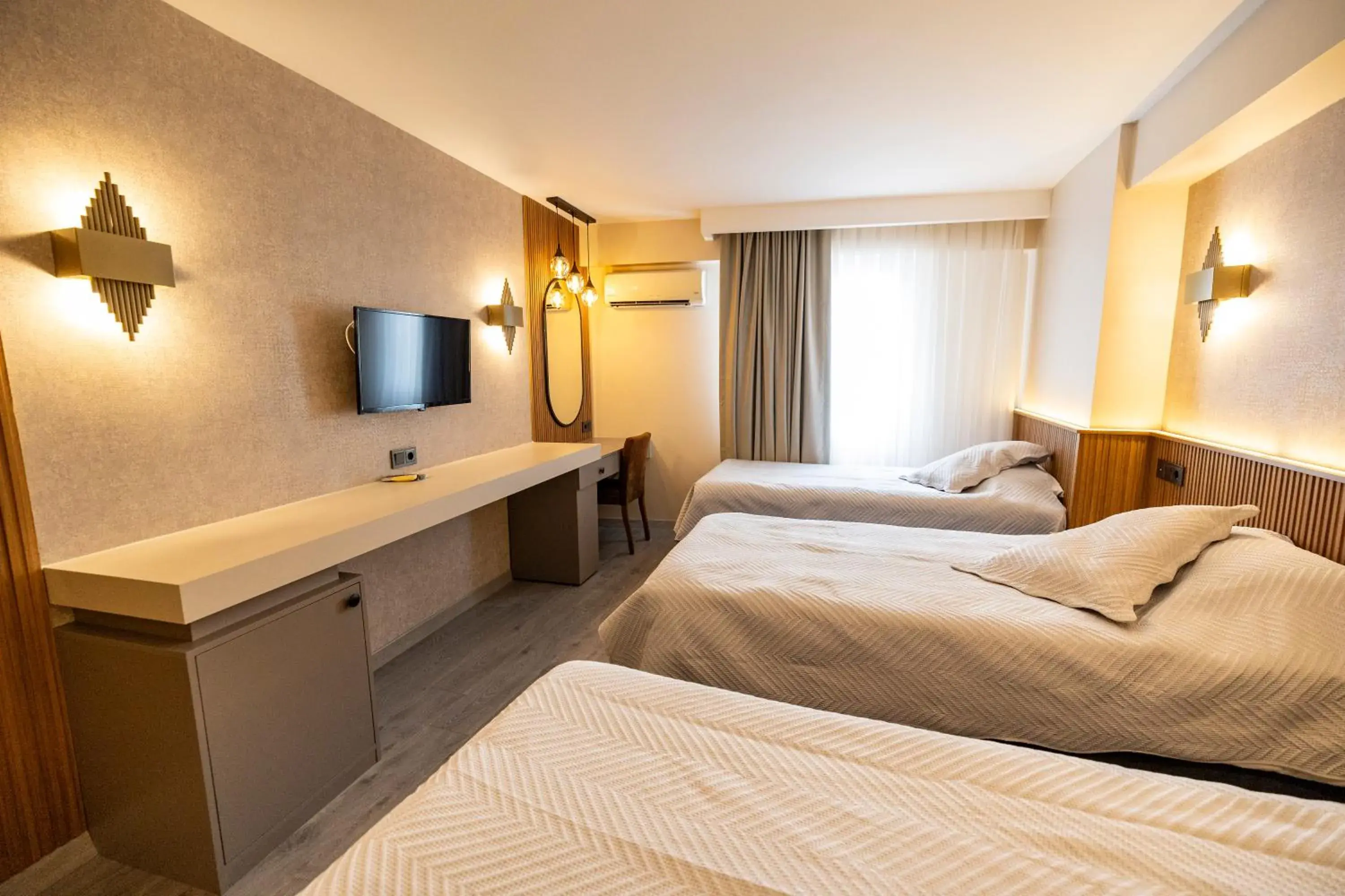 Standard Triple Room in Aktas Hotel Standard Triple Room in Aktas Hotel