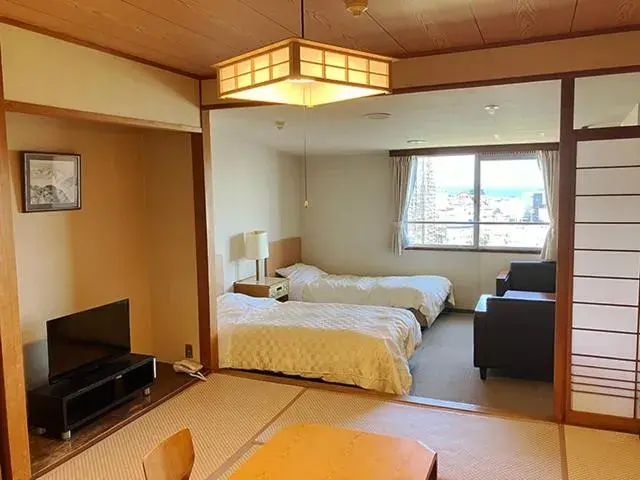 Twin Room with Tatami Area - single occupancy - Non-Smoking in Yunokawa Kanko Hotel Shoen Twin Room with Tatami Area - single occupancy - Non-Smoking in Yunokawa Kanko Hotel Shoen