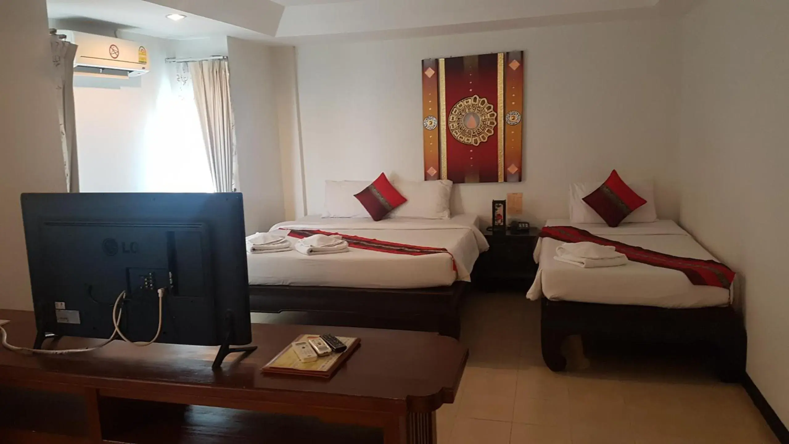 Triple Room in Wangburapa Grand Hotel Triple Room in Wangburapa Grand Hotel