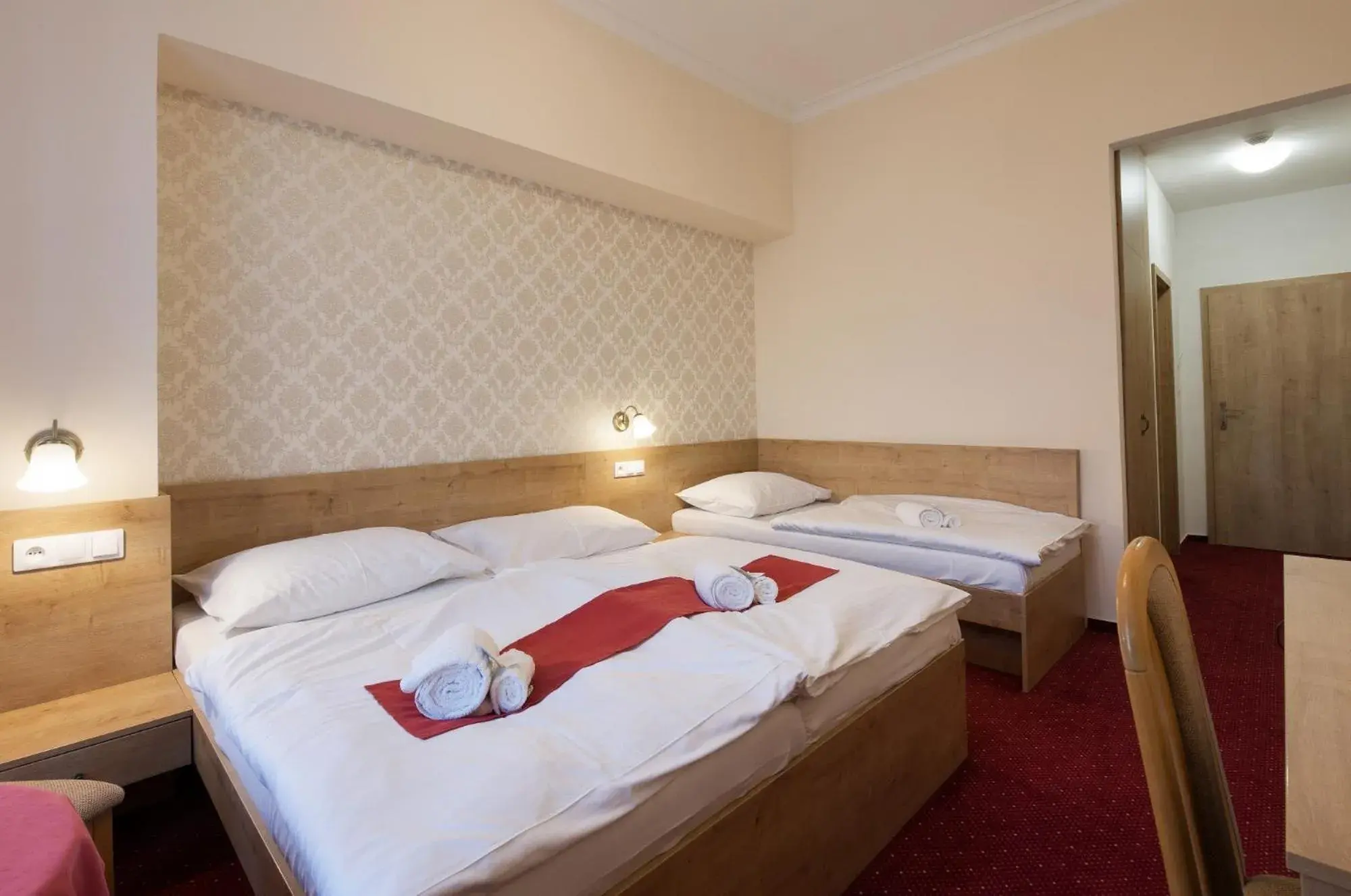 Family Room with two bedrooms and square view in Hotel U Černého orla Family Room with two bedrooms and square view in Hotel U Černého orla