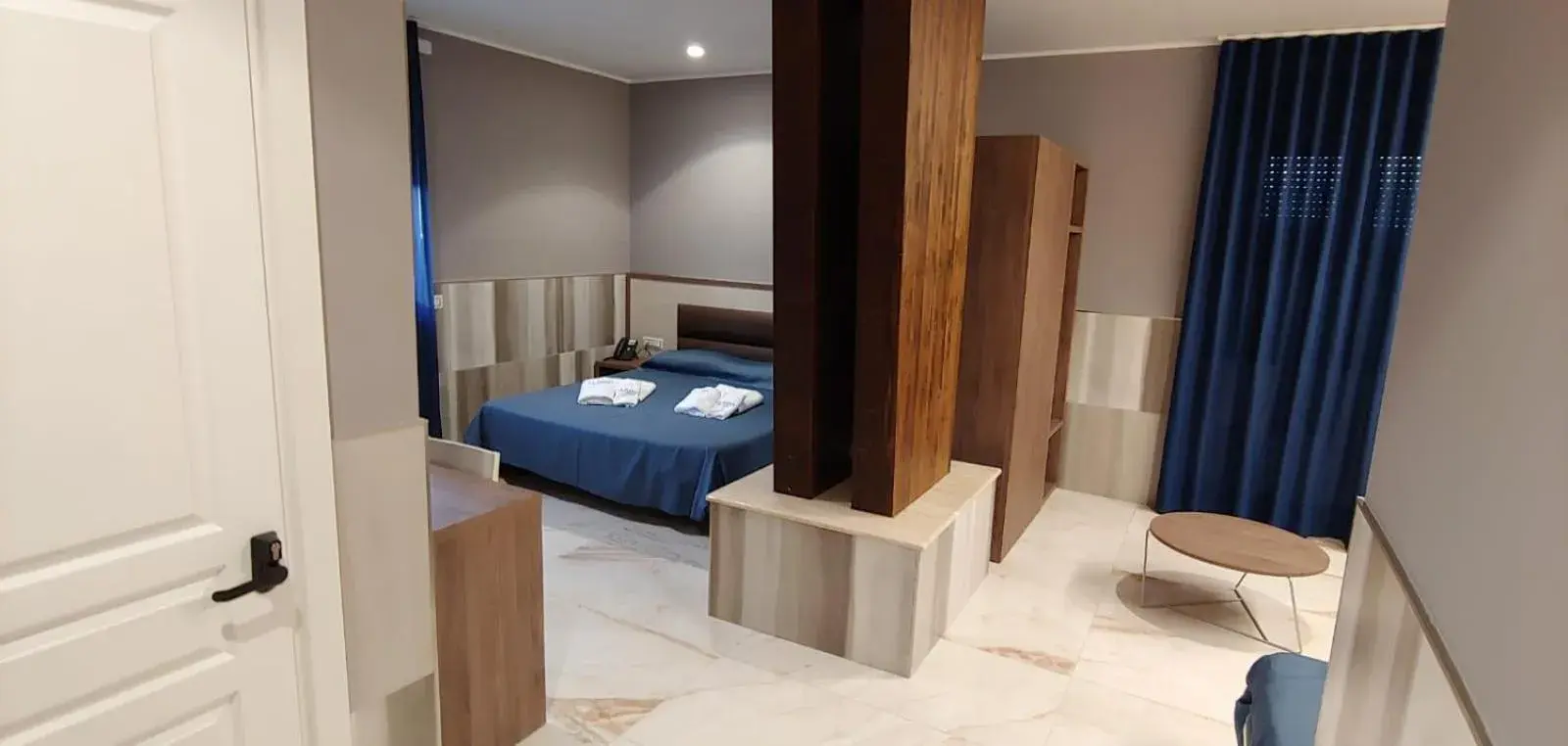 Quadruple Room - single occupancy - Disability Access in La Piana Hotel Quadruple Room - single occupancy - Disability Access in La Piana Hotel