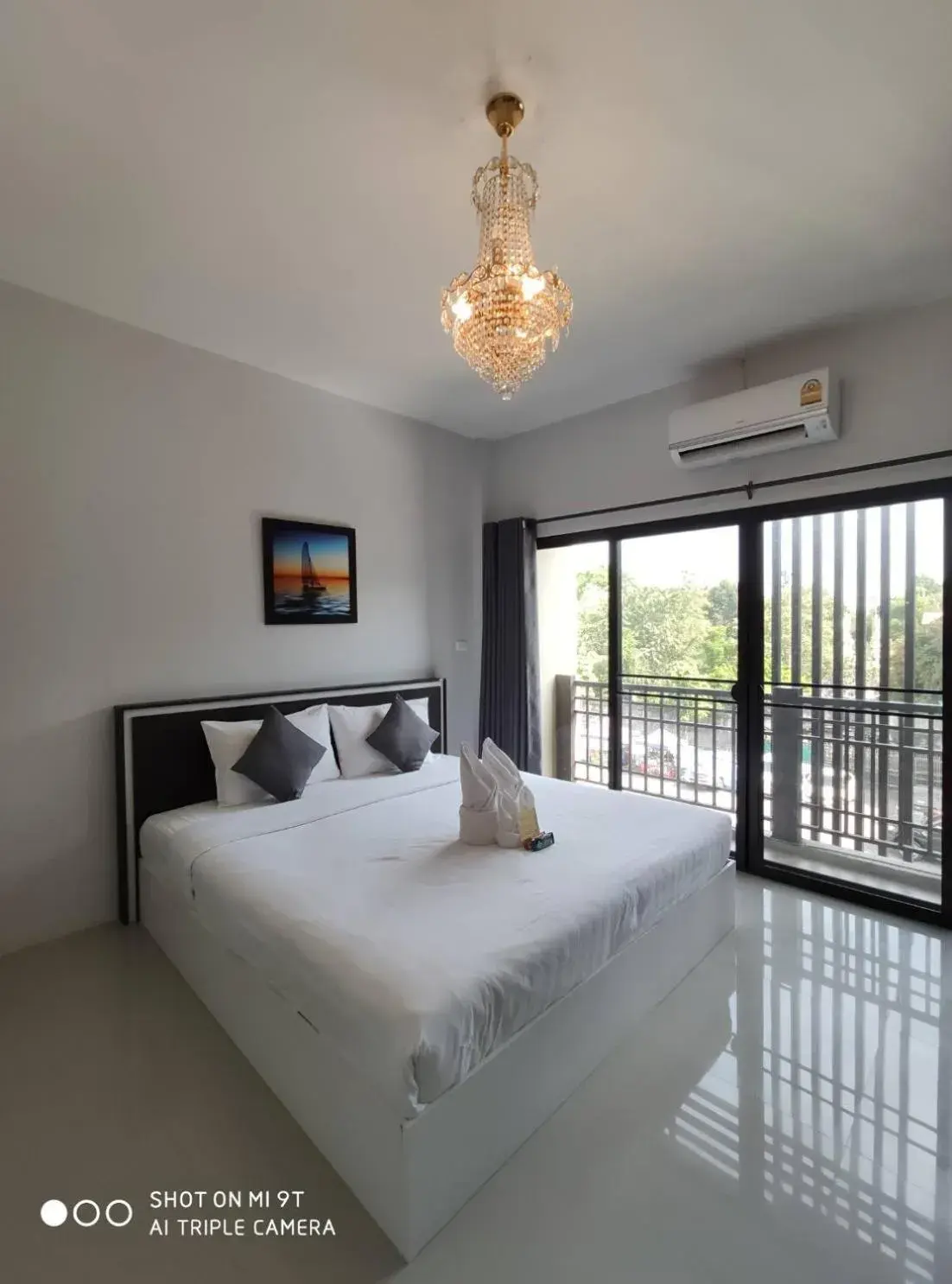 Deluxe Double Room with Balcony in Bann Tawan Hostel Chiang Rai Deluxe Double Room with Balcony in Bann Tawan Hostel Chiang Rai