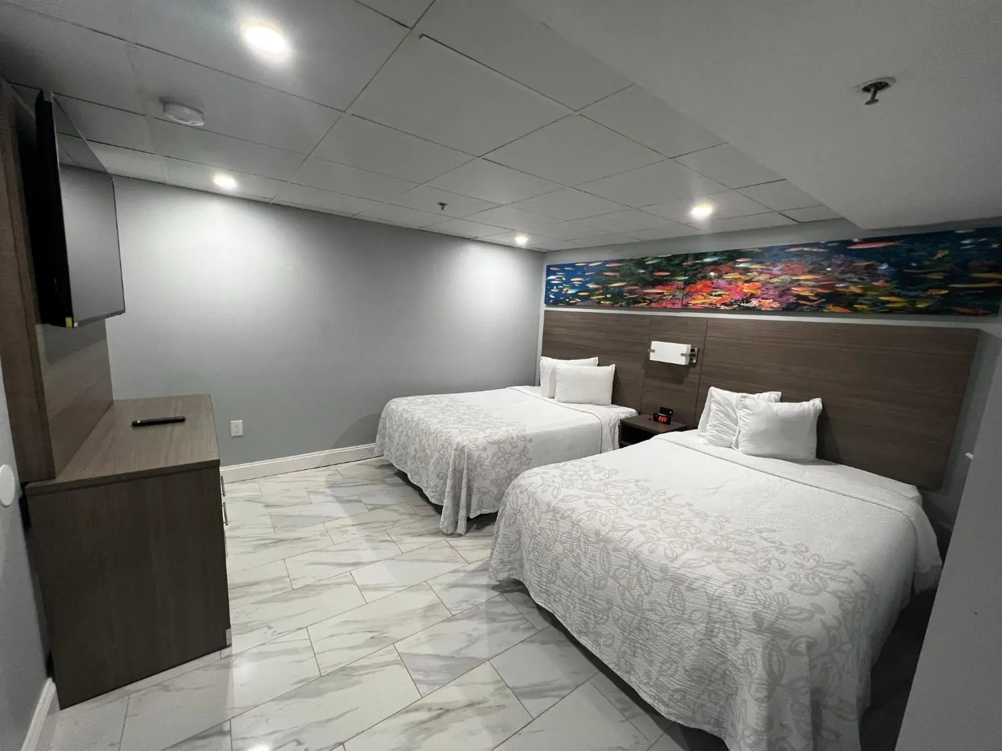 Suite with Two Double Beds with Kitchen Smoke Free in Red Roof PLUS & Suites Virginia Beach - Seaside Suite with Two Double Beds with Kitchen Smoke Free in Red Roof PLUS & Suites Virginia Beach - Seaside