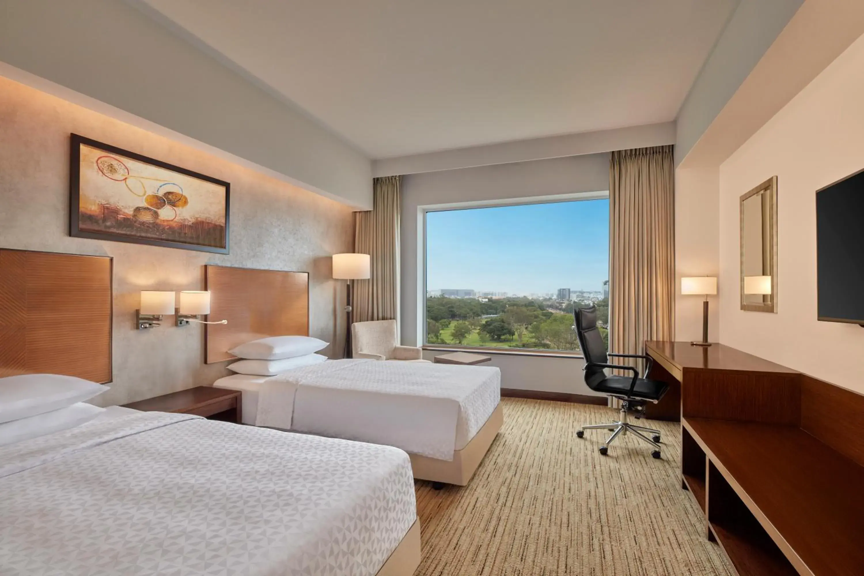 Executive Twin Bed Room (Complimentary Lounge Access with 2 IMFL drinks & snack buffet during 1800 to 2000 hrs) in Four Points by Sheraton Hotel and Serviced Apartments Pune Executive Twin Bed Room (Complimentary Lounge Access with 2 IMFL drinks & snack buffet during 1800 to 2000 hrs) in Four Points by Sheraton Hotel and Serviced Apartments Pune