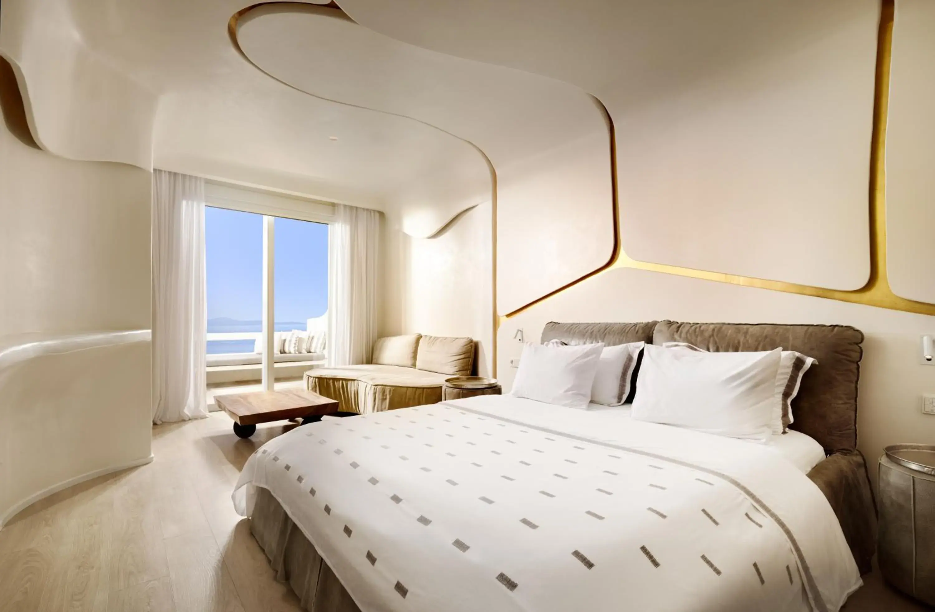 Junior Suite with Outdoor Hot Tub in Cavo Tagoo Mykonos Junior Suite with Outdoor Hot Tub in Cavo Tagoo Mykonos