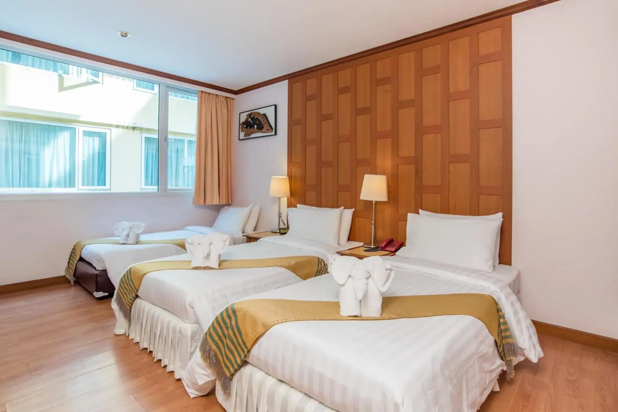 Superior Triple Room in New Siam Riverside Superior Triple Room in New Siam Riverside