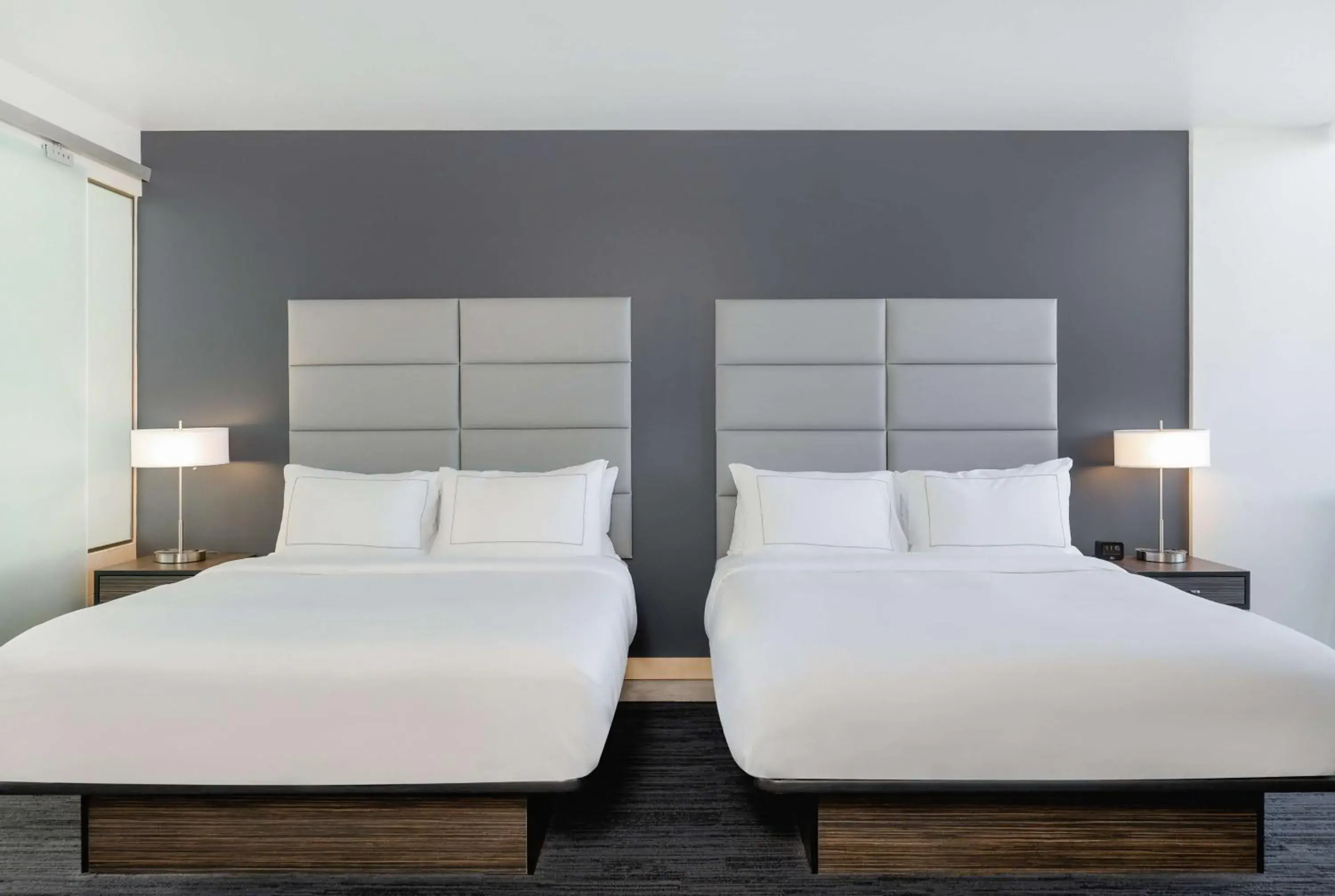 Queen Room with Two Queen Beds and Kitchenette in Hotelvetro Iowa City, Tapestry Collection By Hilton Queen Room with Two Queen Beds and Kitchenette in Hotelvetro Iowa City, Tapestry Collection By Hilton