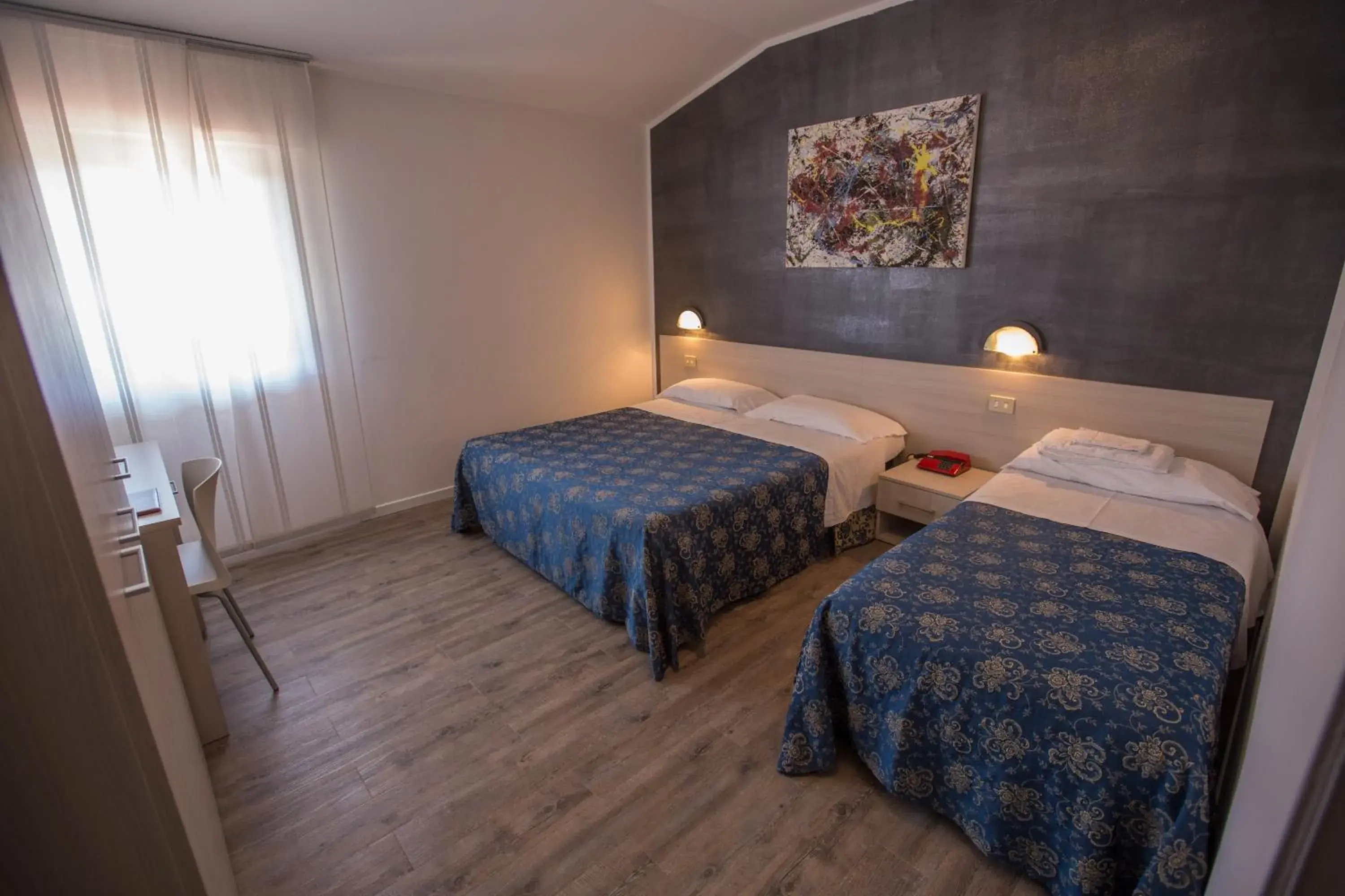 Triple Room in Hotel Rossi Triple Room in Hotel Rossi