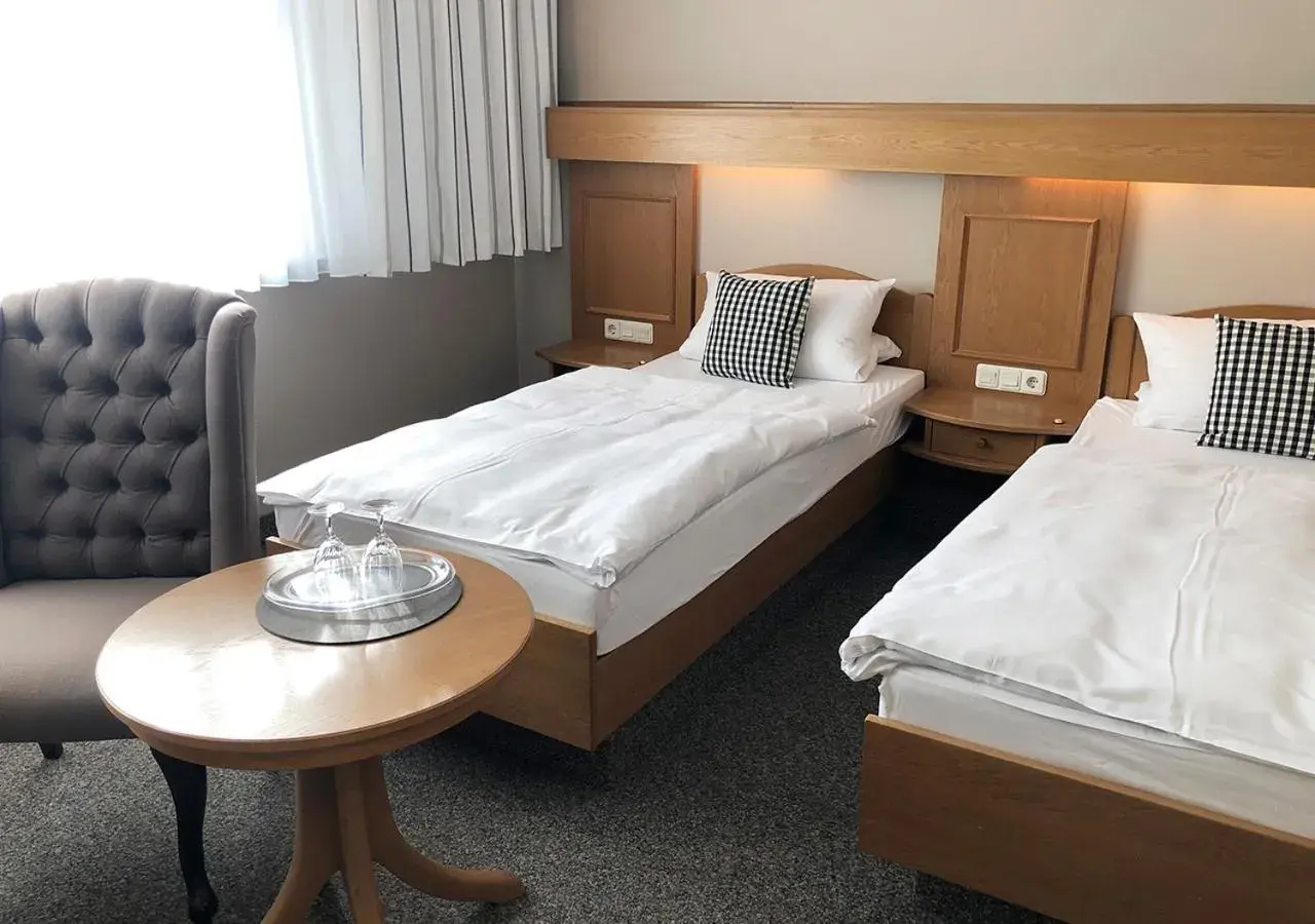 Business Single Room in Mangolds Boutique Hotel & Fruehstuecksmeisterei Business Single Room in Mangolds Boutique Hotel & Fruehstuecksmeisterei