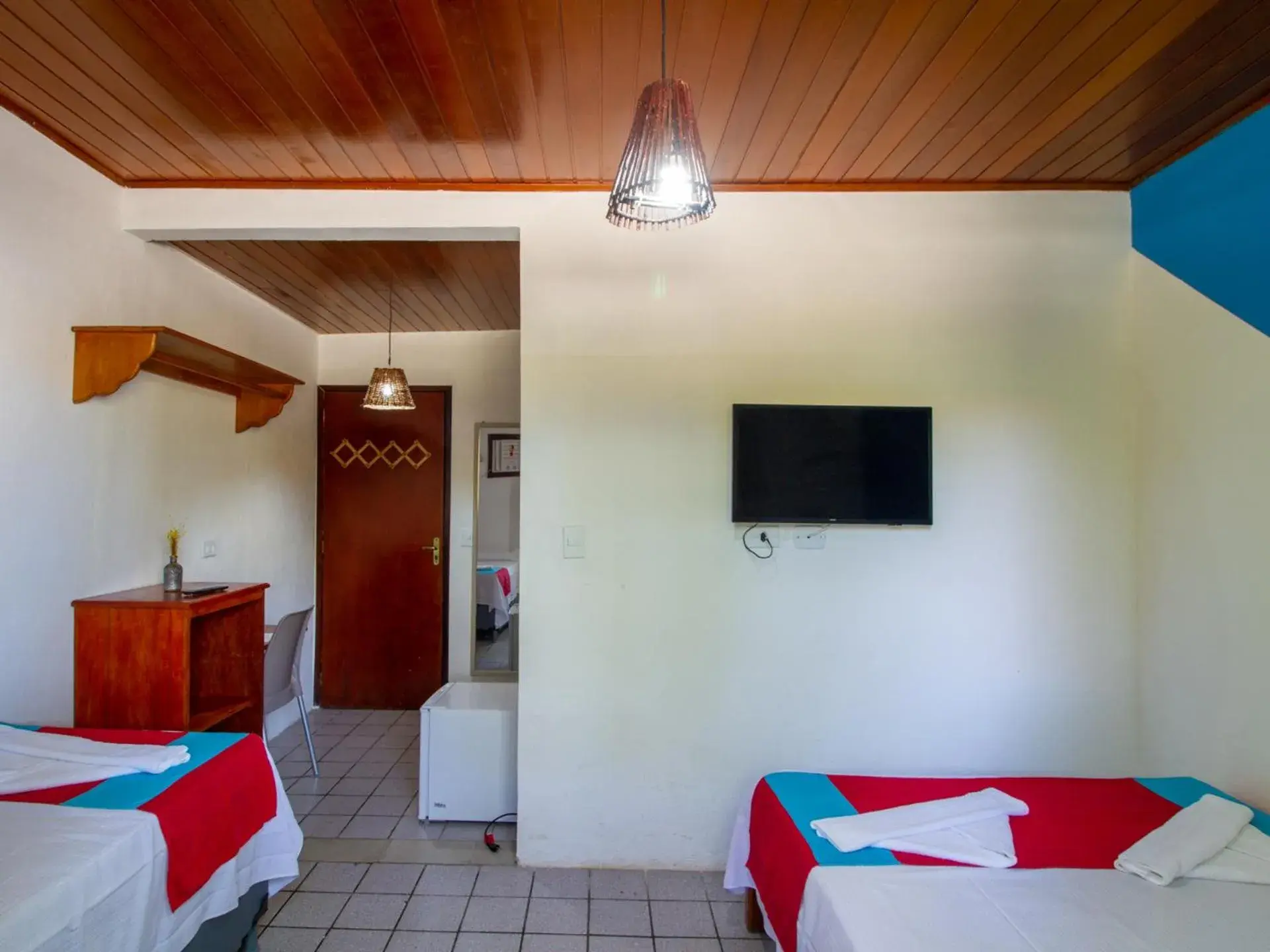 Triple Room in Pousada Hibiscus Triple Room in Pousada Hibiscus