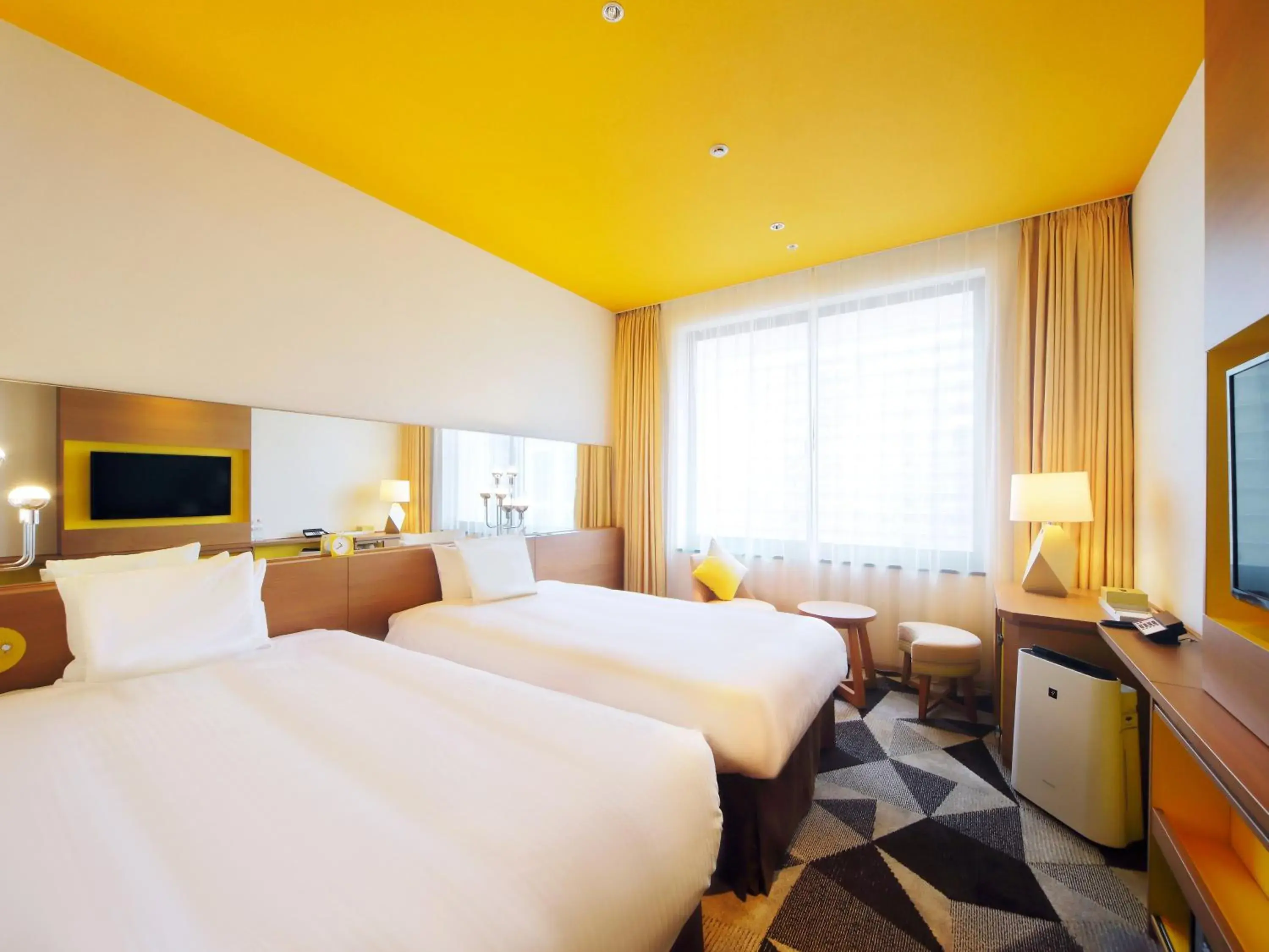 Standard Triple Room in Hotel Universal Port Vita Standard Triple Room in Hotel Universal Port Vita