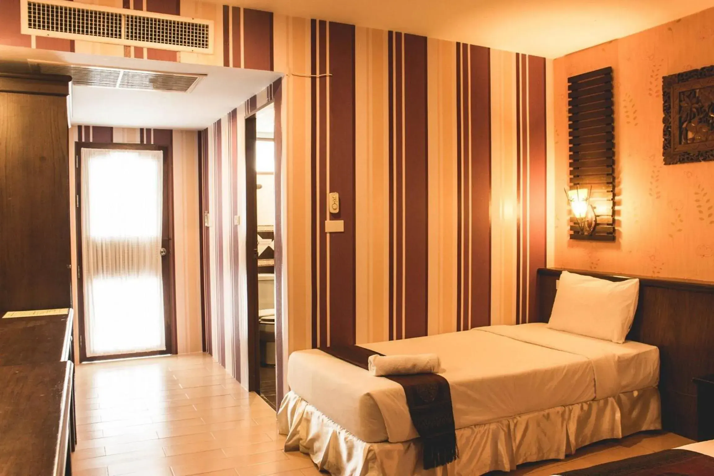 Deluxe Triple Room in Natural Samui Hotel Deluxe Triple Room in Natural Samui Hotel