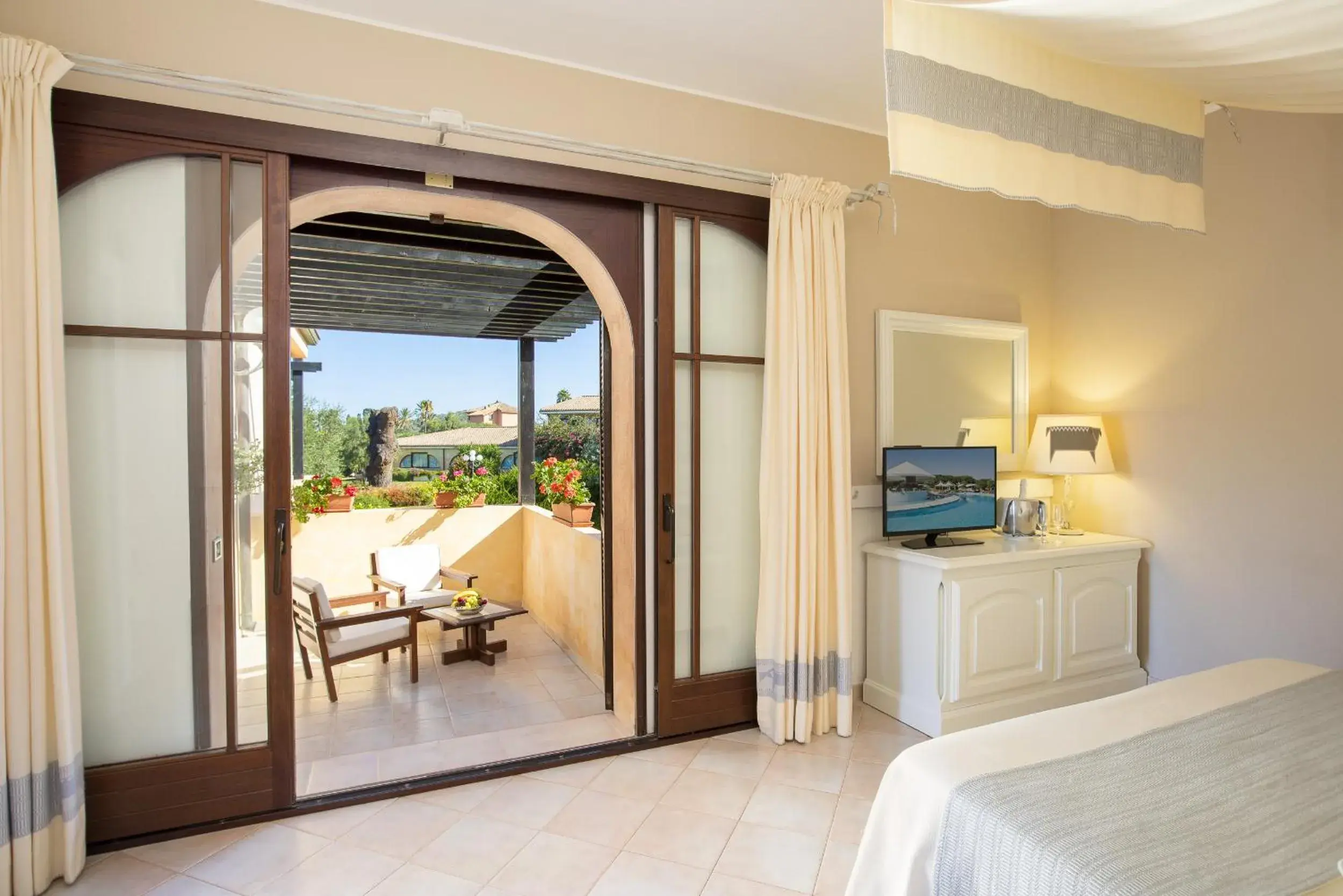 Standard Double Room with Garden View in Hotel Baia di Nora Standard Double Room with Garden View in Hotel Baia di Nora