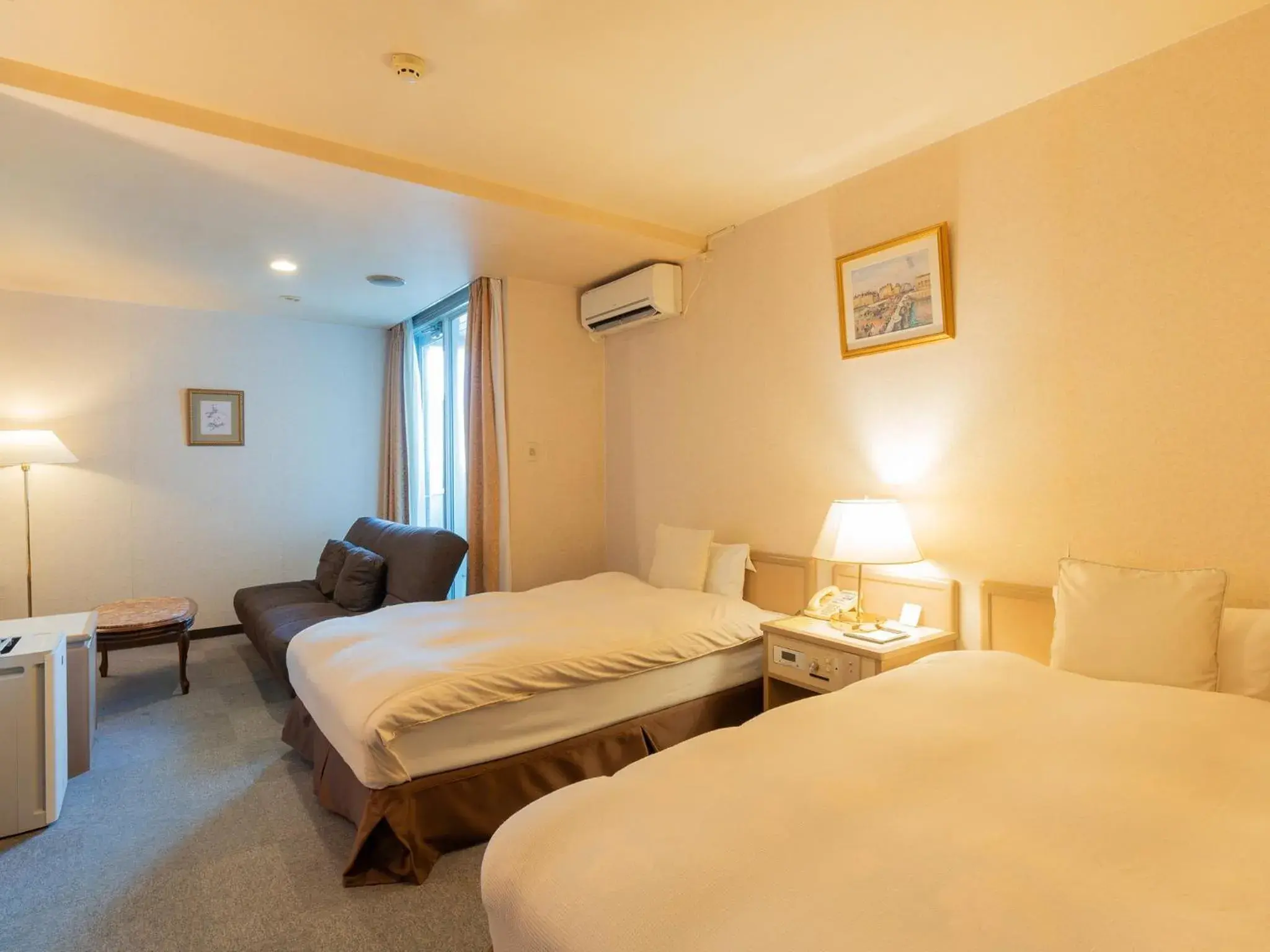 Deluxe Twin Room with Balcony - single occupancy in Hotel New Century Deluxe Twin Room with Balcony - single occupancy in Hotel New Century