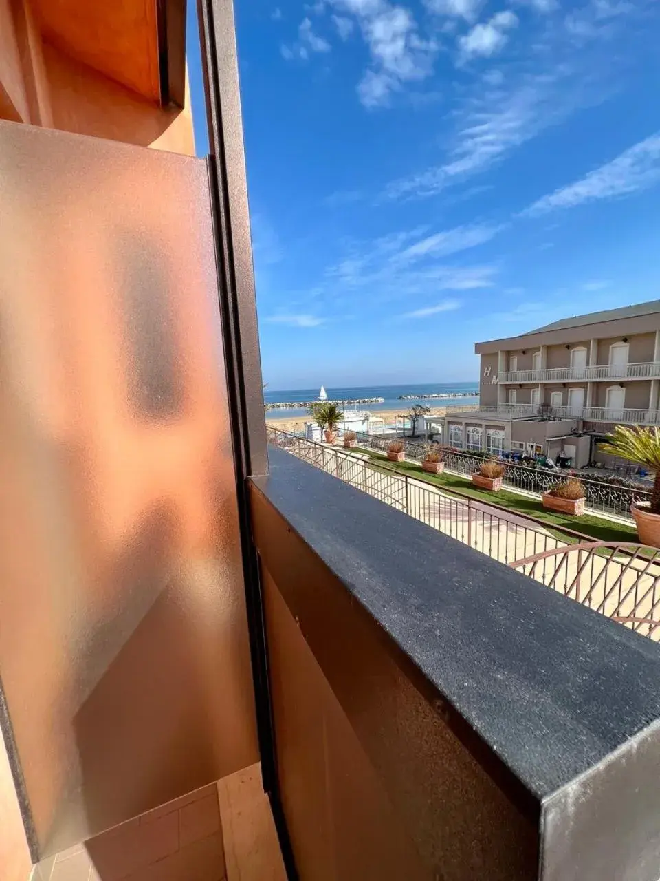 Triple Room with Balcony and Lateral Sea View in Hotel Giorgetti Orange Triple Room with Balcony and Lateral Sea View in Hotel Giorgetti Orange