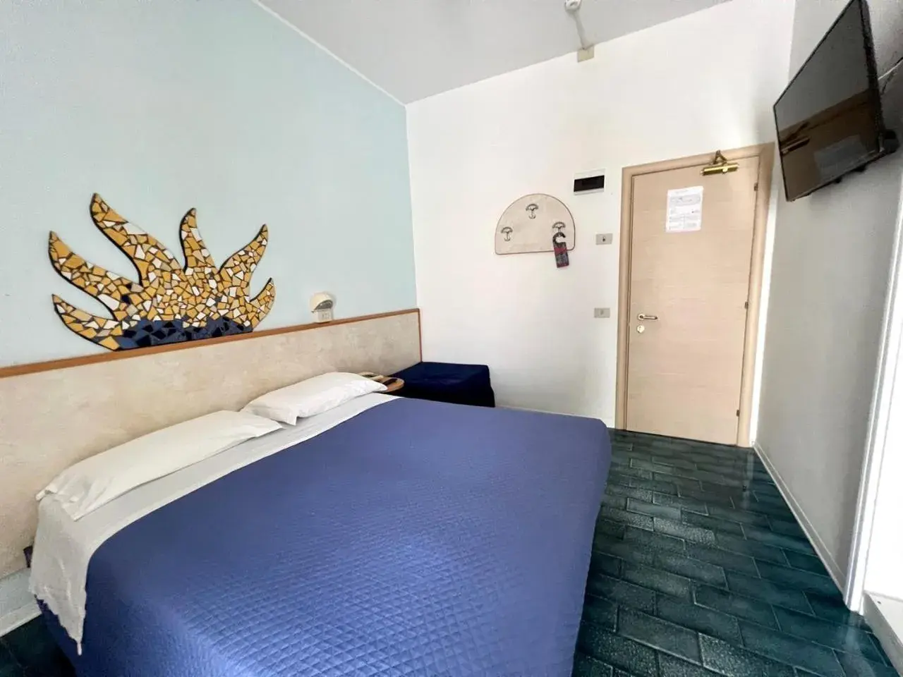 Quadruple Room with Balcony in Hotel Giorgetti Orange Quadruple Room with Balcony in Hotel Giorgetti Orange