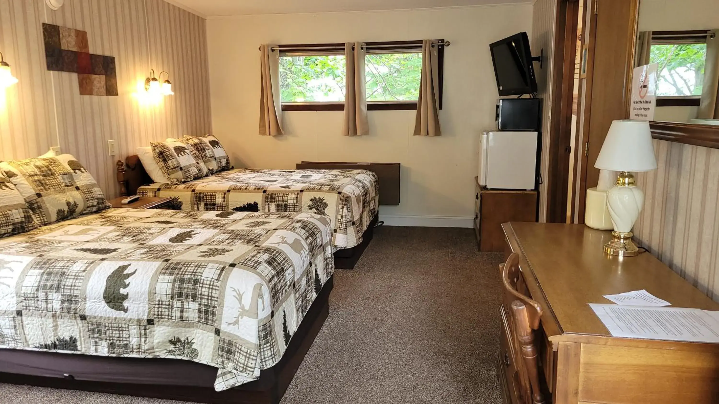 Motel Room with Two Double Beds Upstairs in Weirs Beach Motel & Cottages Motel Room with Two Double Beds Upstairs in Weirs Beach Motel & Cottages