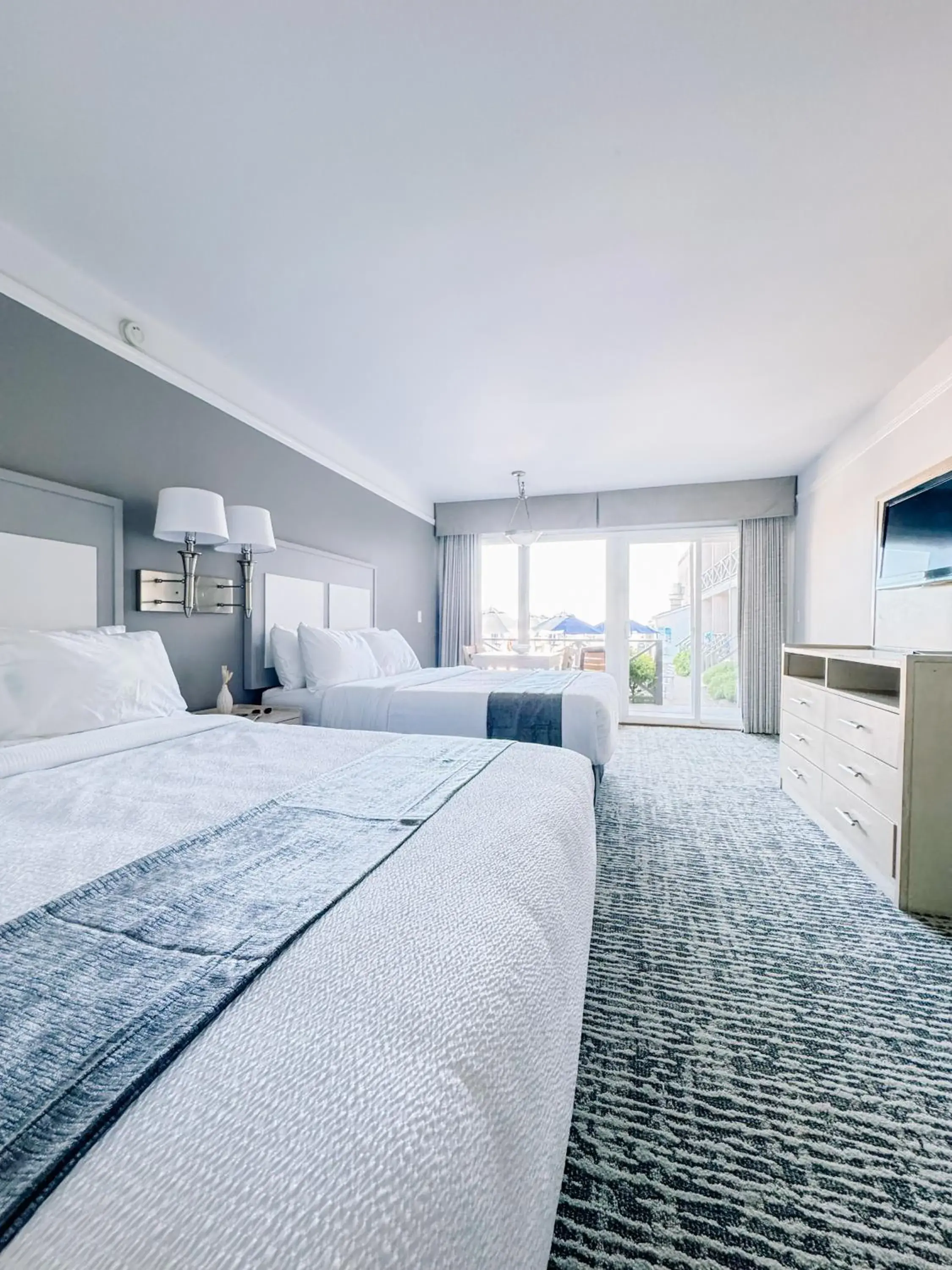 Deluxe Queen Room with Two Queen Beds - Oceanfront Pool Courtyard in Royal Atlantic Beach Resort Deluxe Queen Room with Two Queen Beds - Oceanfront Pool Courtyard in Royal Atlantic Beach Resort