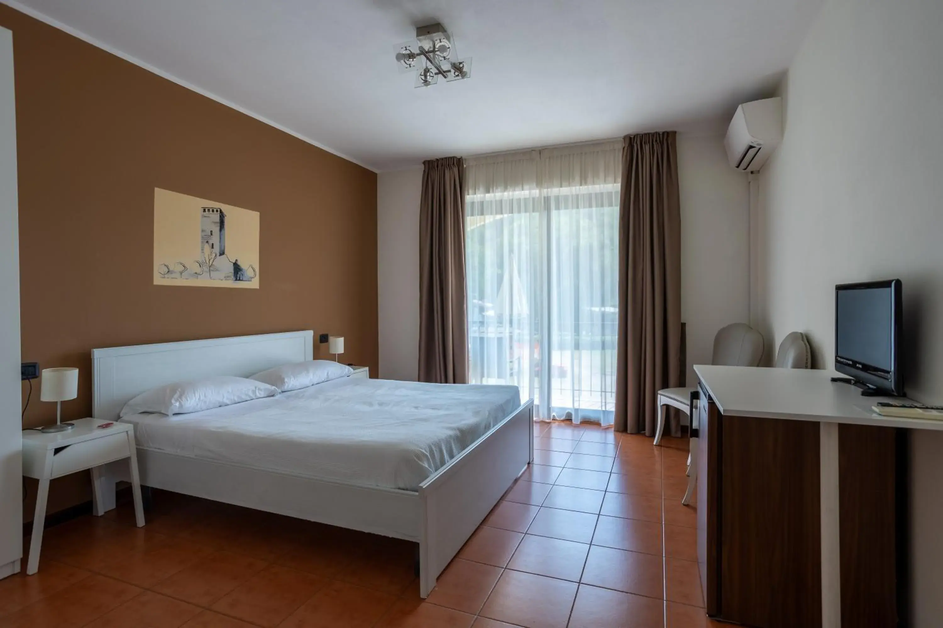 Quadruple Room with Balcony in Hotel Fontaine Bleue Quadruple Room with Balcony in Hotel Fontaine Bleue