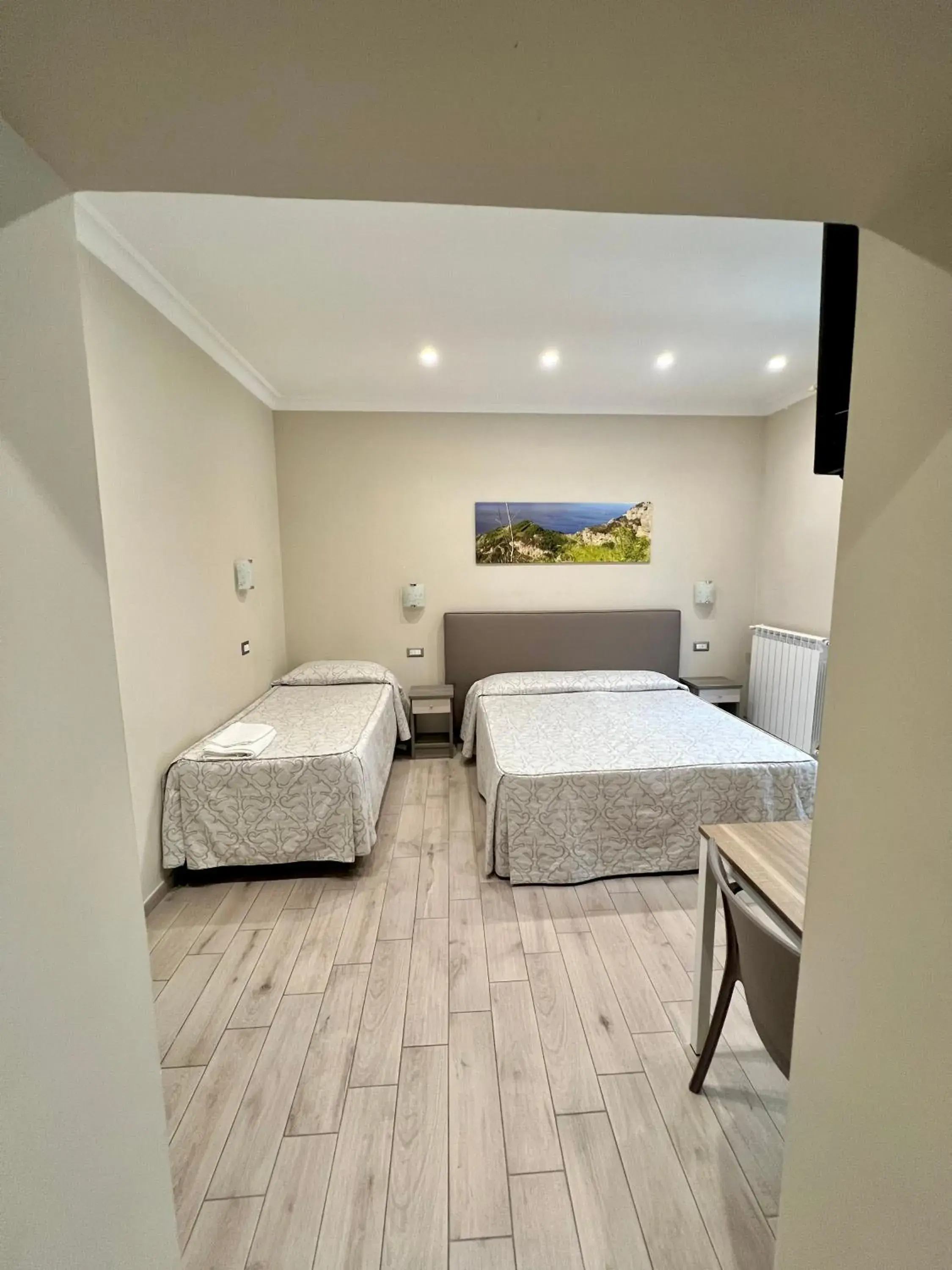 Comfort Triple Room in Relais Milò Comfort Triple Room in Relais Milò