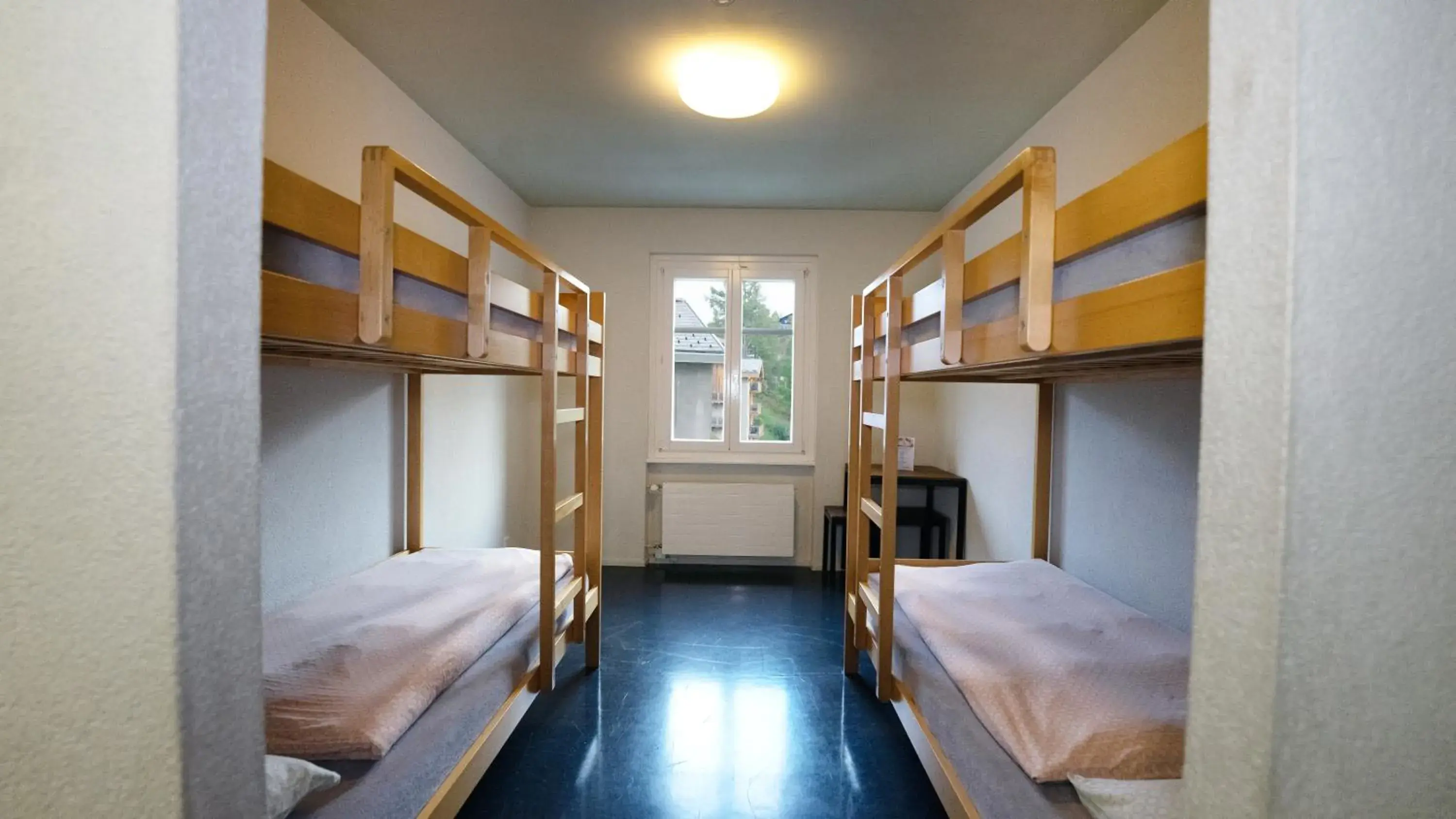Quadruple Room with Shared Bathroom in Zermatt Youth Hostel Quadruple Room with Shared Bathroom in Zermatt Youth Hostel