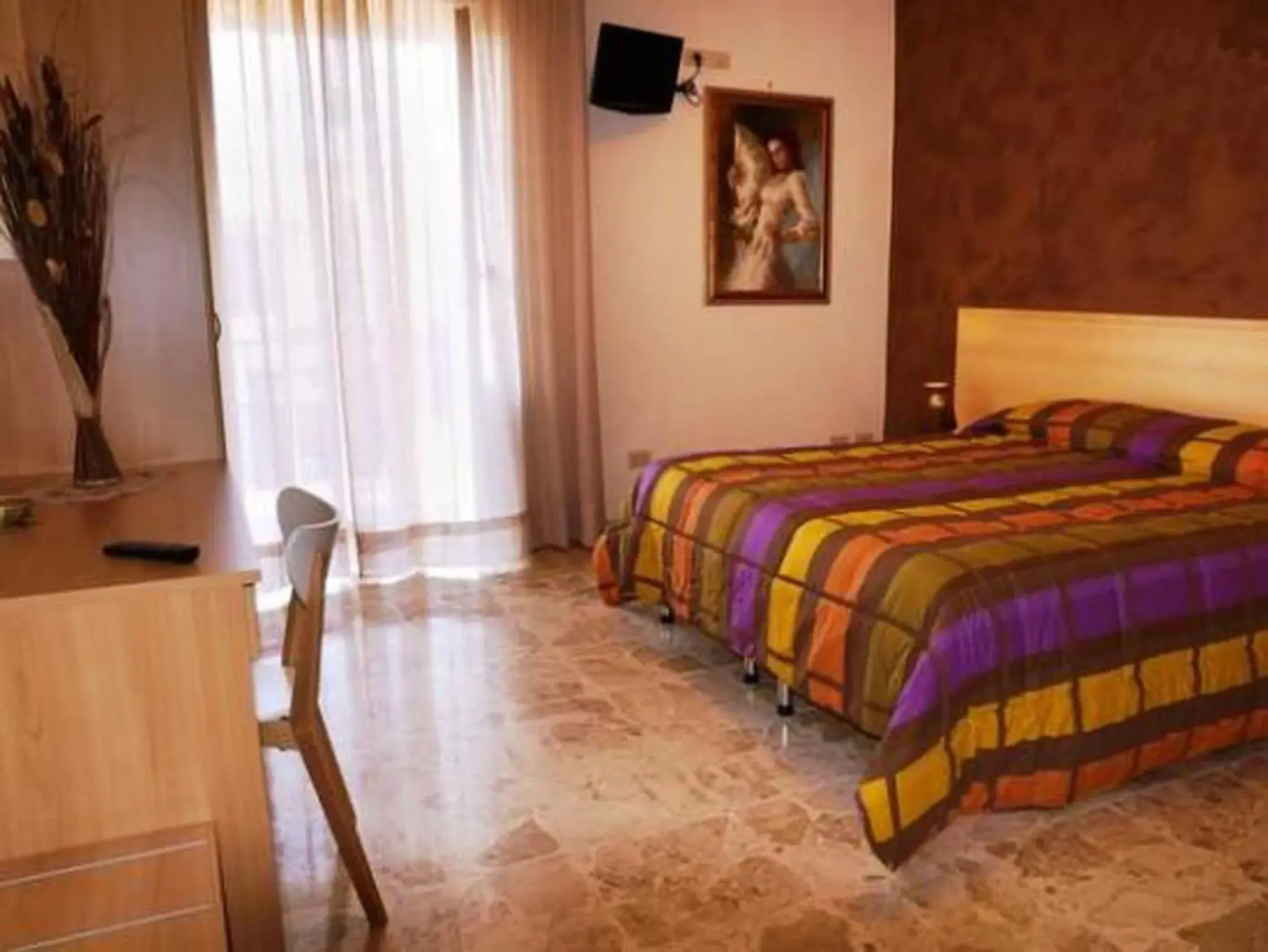 Quadruple Room with Private External Bathroom in B&B Raggio Di Sole Quadruple Room with Private External Bathroom in B&B Raggio Di Sole