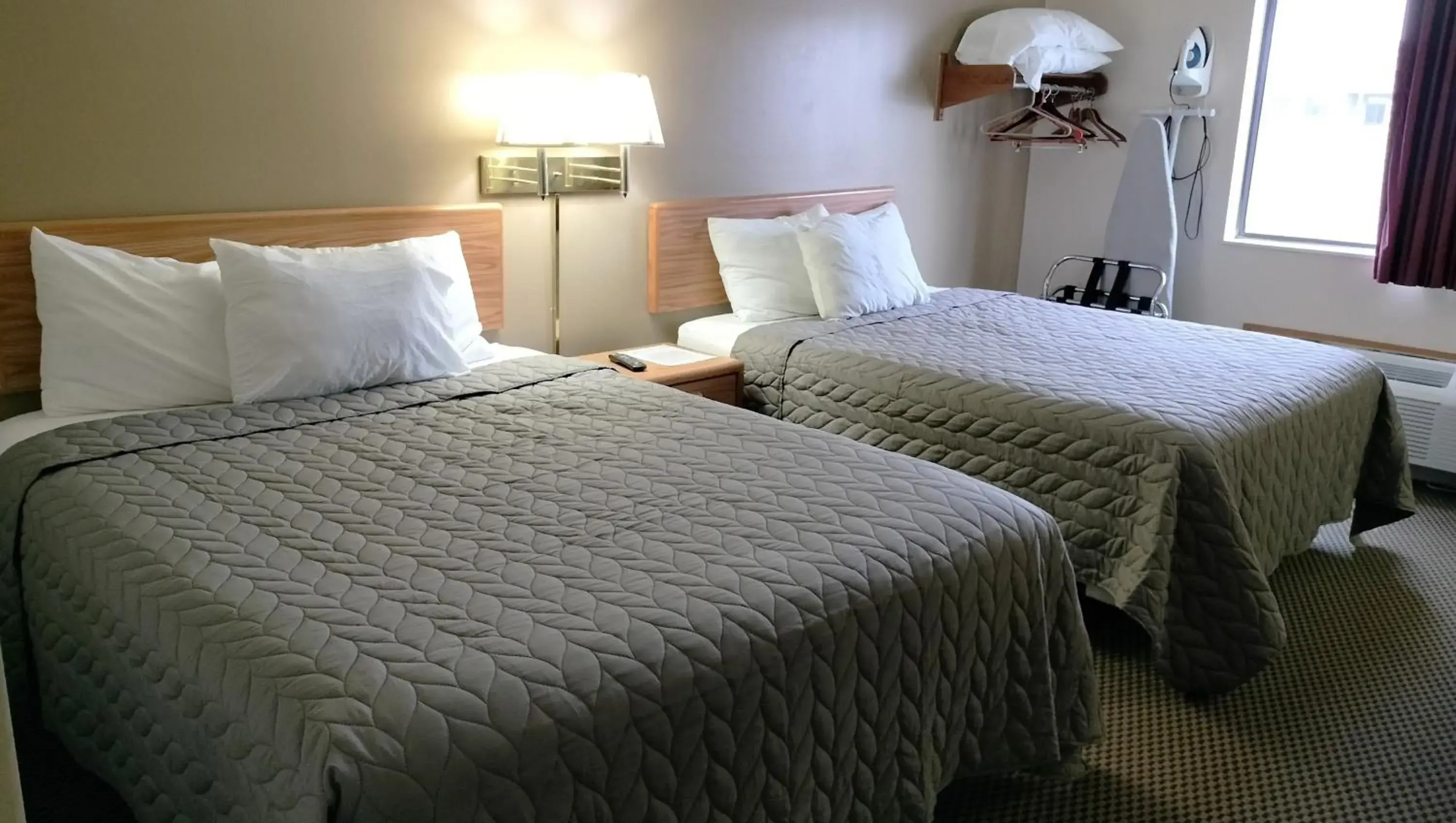 Queen Room with Two Queen Beds - Non-Smoking in Magnuson Hotel Ironwood Queen Room with Two Queen Beds - Non-Smoking in Magnuson Hotel Ironwood