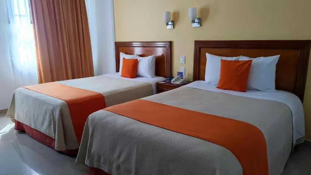 Triple Room in Hotel Báez Carrizal Triple Room in Hotel Báez Carrizal