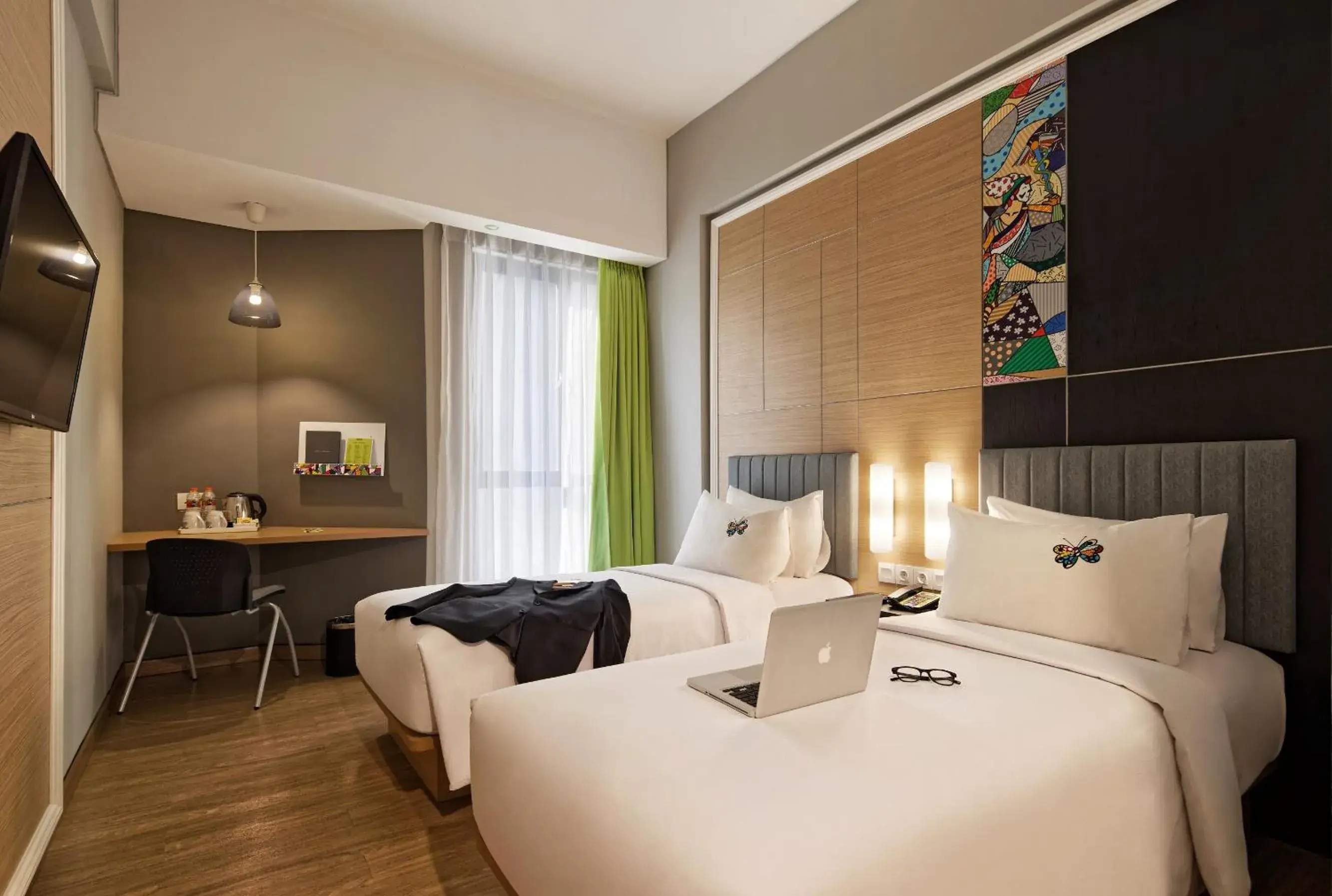 Happiness Twin Room in MaxOne Platinum Hayam Wuruk Happiness Twin Room in MaxOne Platinum Hayam Wuruk