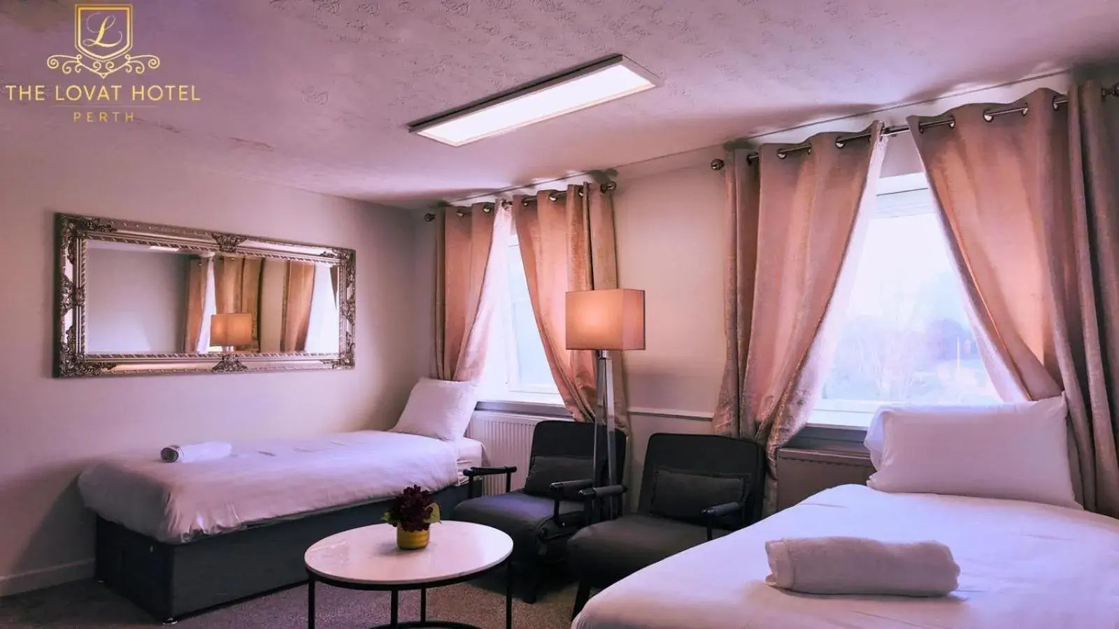 Quadruple Room with Sofa Bed in Lovat Hotel Quadruple Room with Sofa Bed in Lovat Hotel